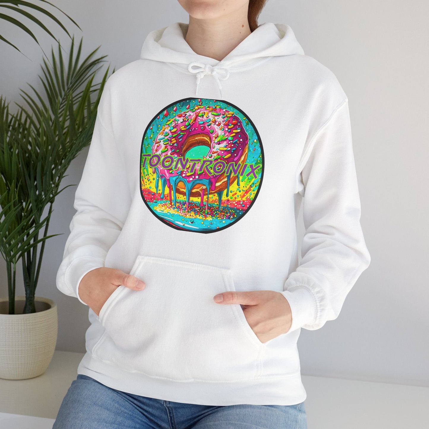 Unisex heavy blend sweatshirt featuring a vibrant Toontronix donut design with a spacious kangaroo pocket and adjustable drawstring hood.