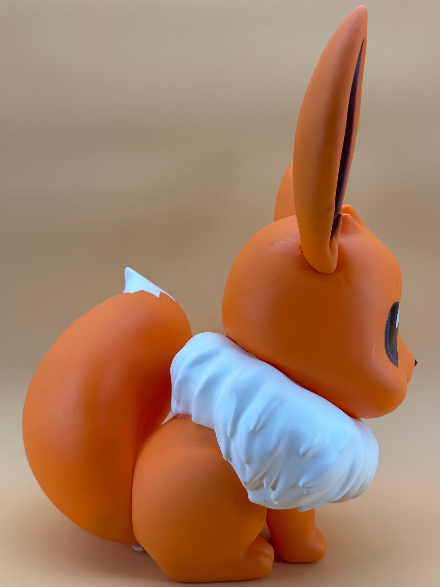 14.5" Eevee large statue USB desk lamp with built-in cord, depicting an orange-toned Eevee in a seated position, over 1 foot tall.