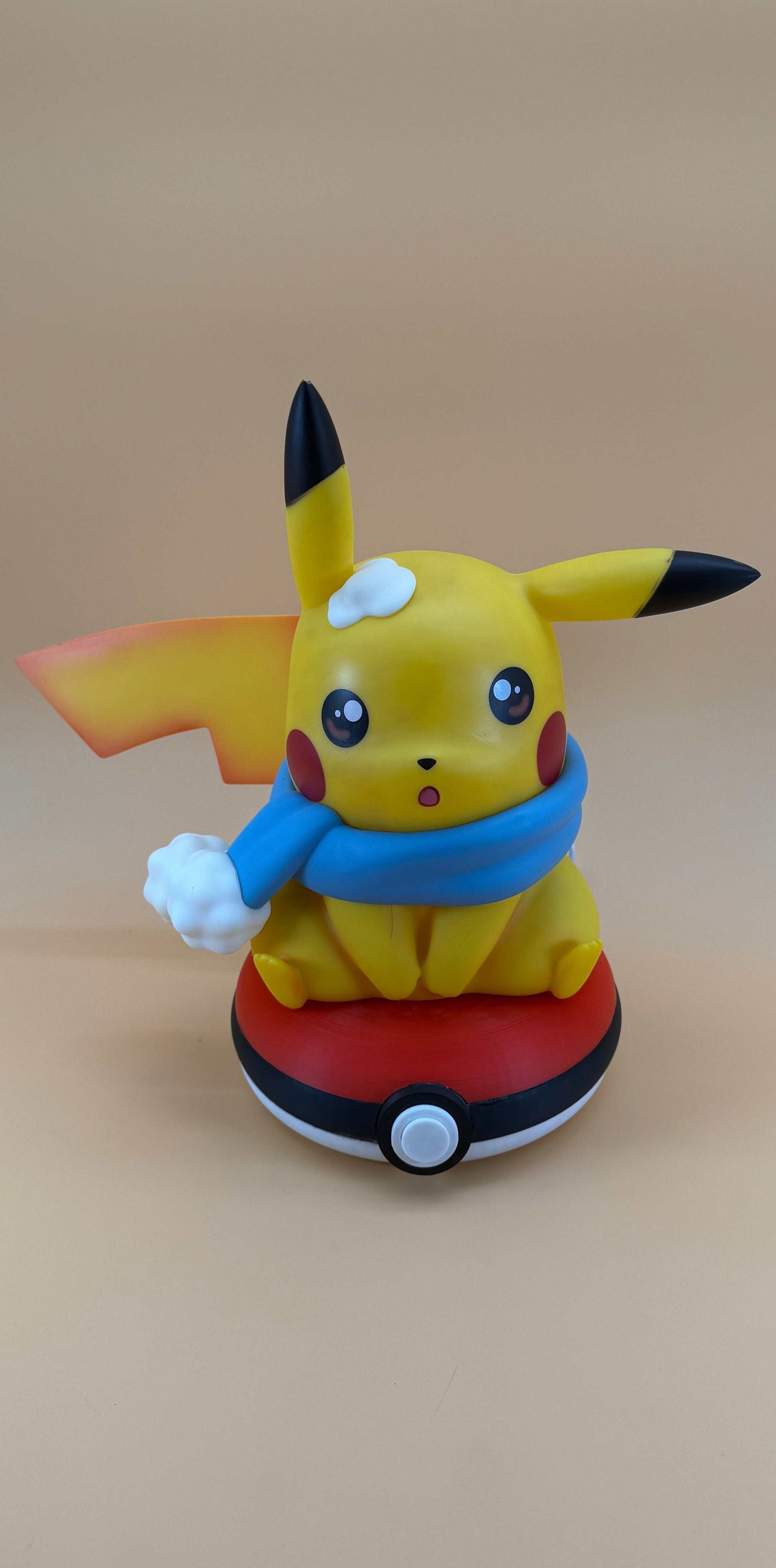 Winter Pikachu Pokeball desk lamp featuring USB connectivity, perfect for adding charm to your space.