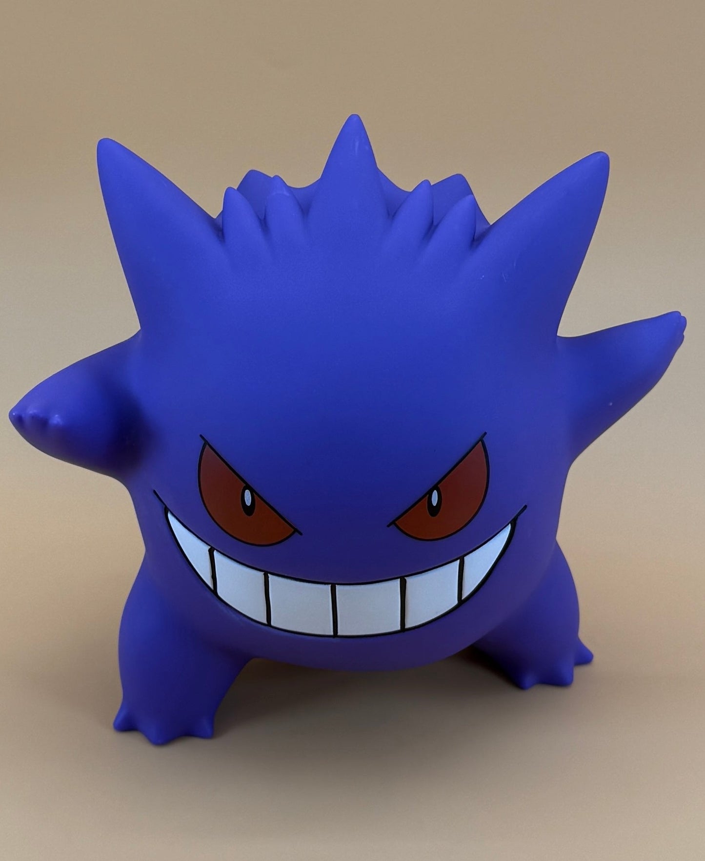 7-inch Gengar statue desk lamp with built-in USB cord, featuring a whimsical Pokemon design.