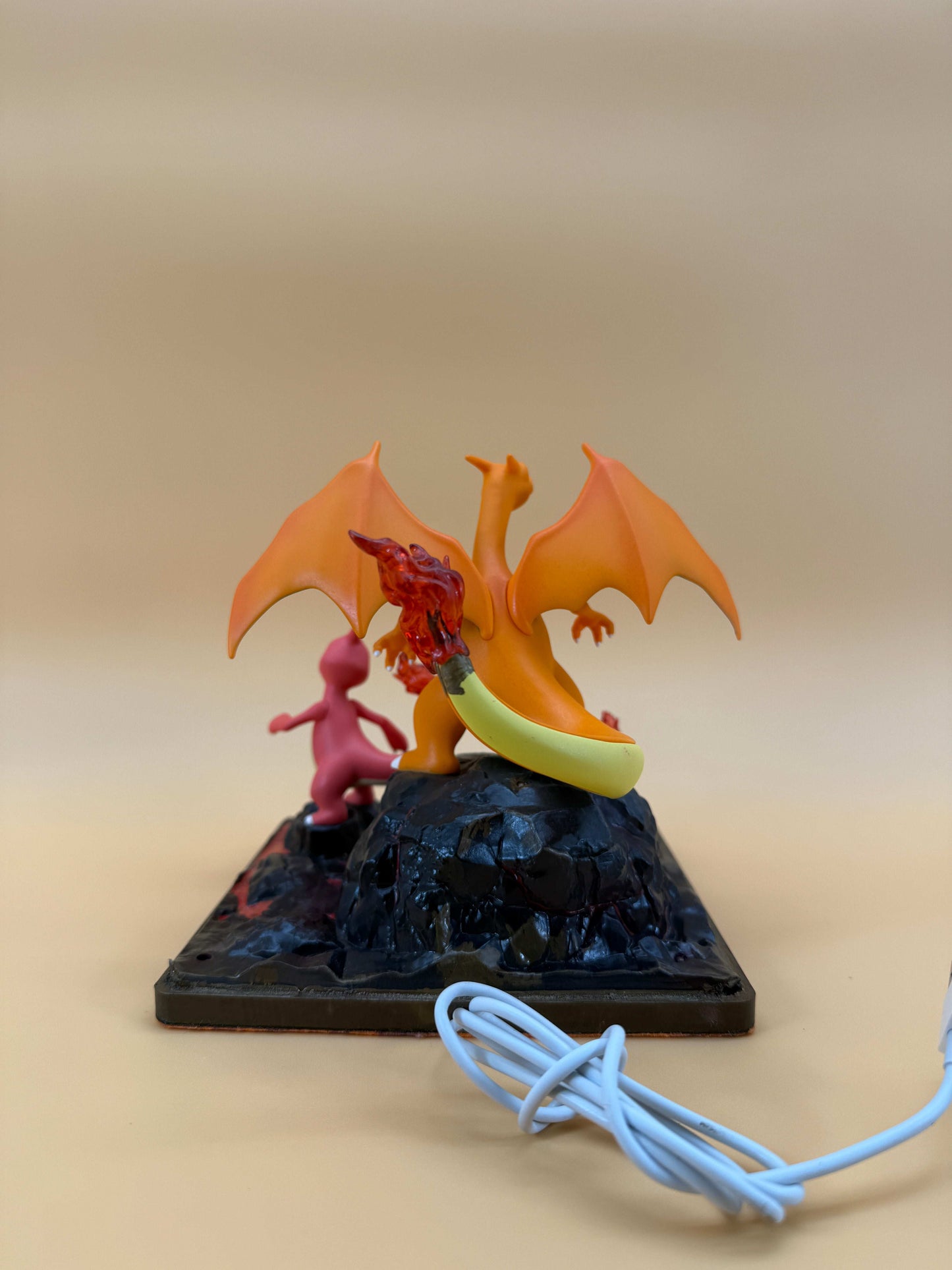 6" Charizard Charmeleon Charmander statue desk lamp with built-in USB, featuring detailed designs of the Pokémon trio on a square base.