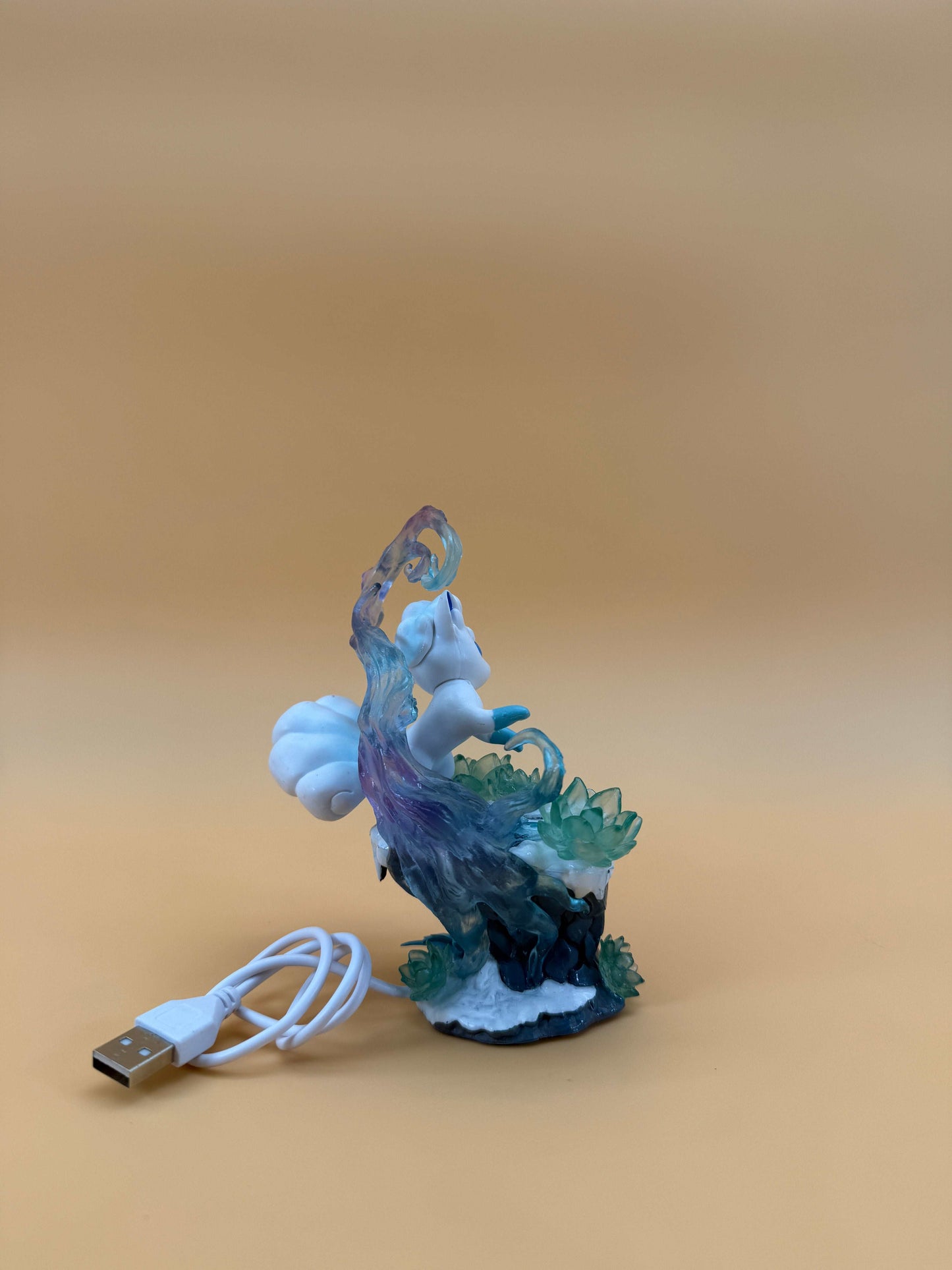 5" Alolan Vulpix Statue Pokemon Desk Lamp with USB cord on display.