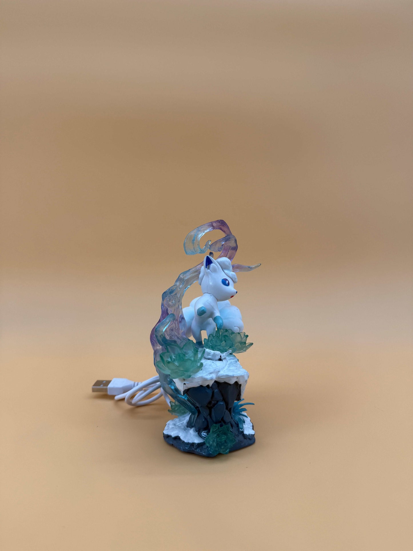 5" Alolan Vulpix statue desk lamp with USB cord on display.