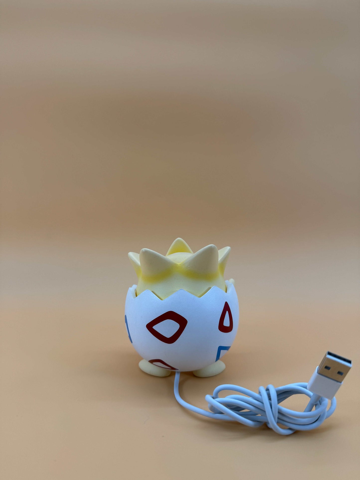 Togepi desk lamp with built-in USB cord, perfect for adding a magical touch to any space.