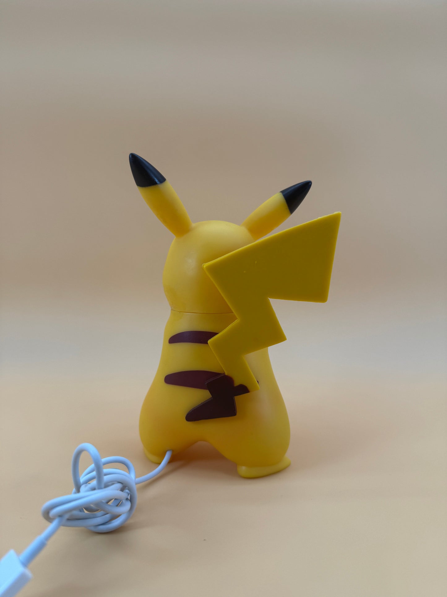 7" Angry Pikachu Statue USB Desk Lamp with cord, unique decorative lighting.