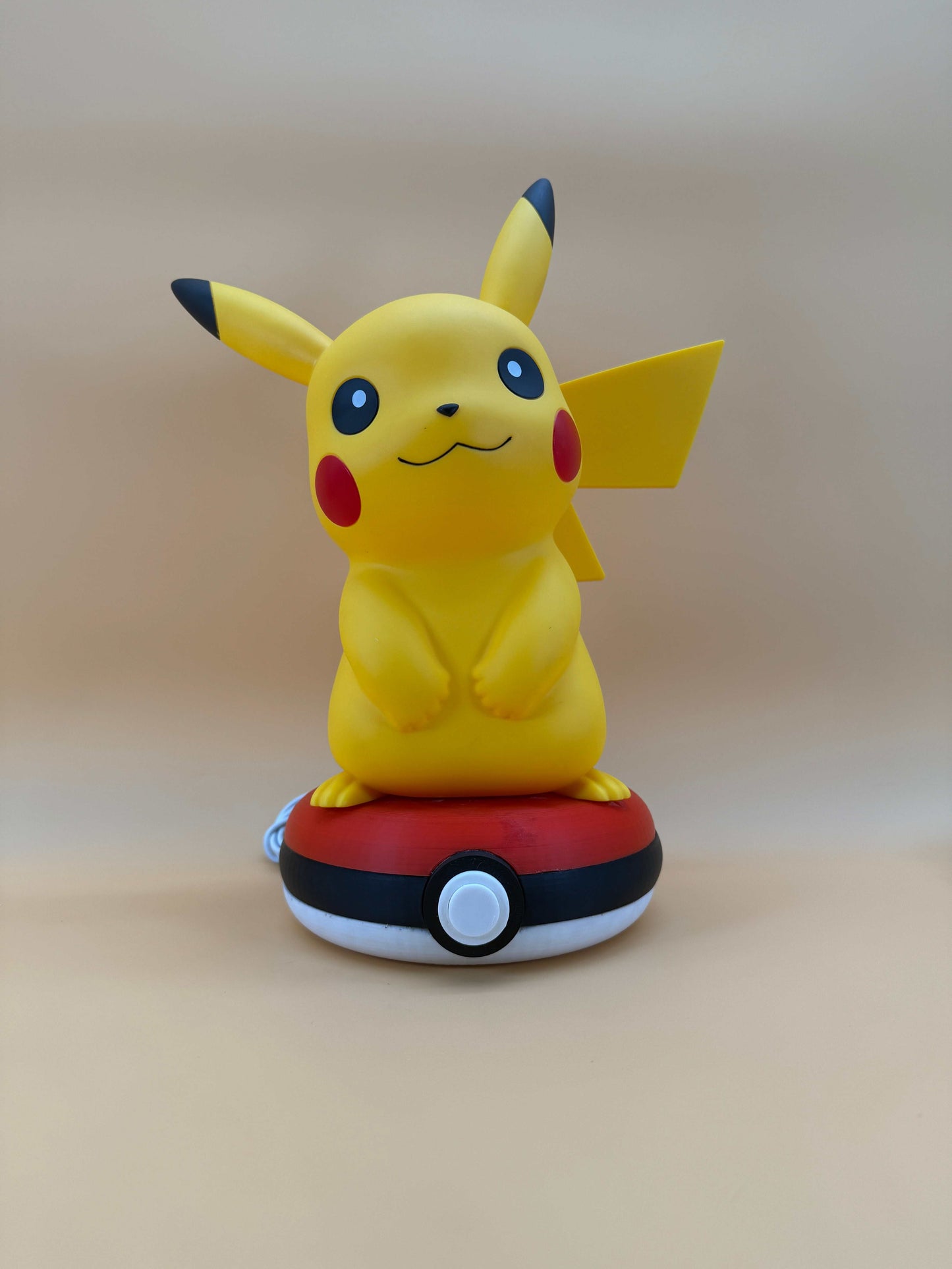 12” Pikachu Pokeball statue USB desk lamp with built-in USB cord.