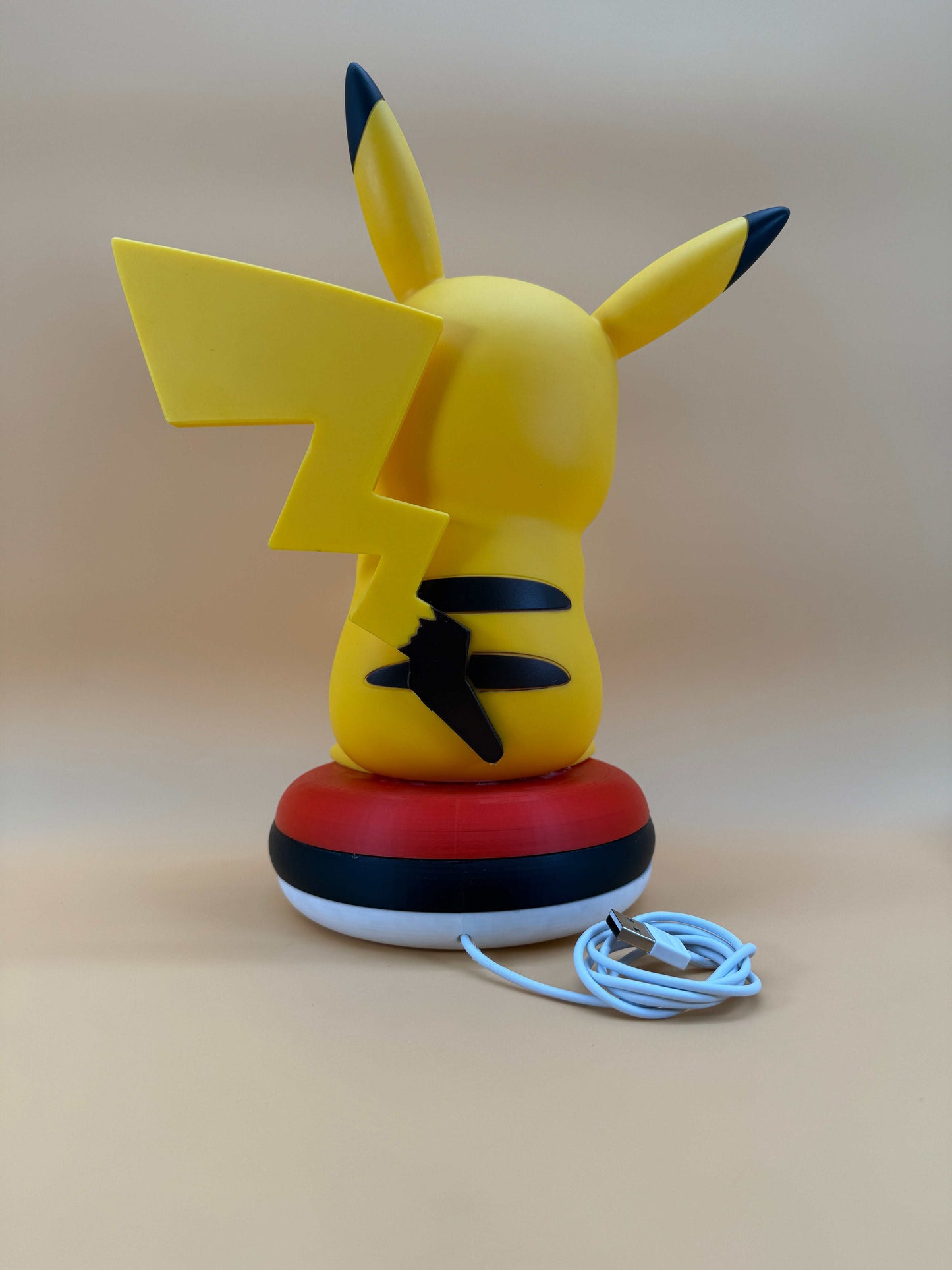 12” Pikachu Pokeball USB desk lamp on a Pokeball base.