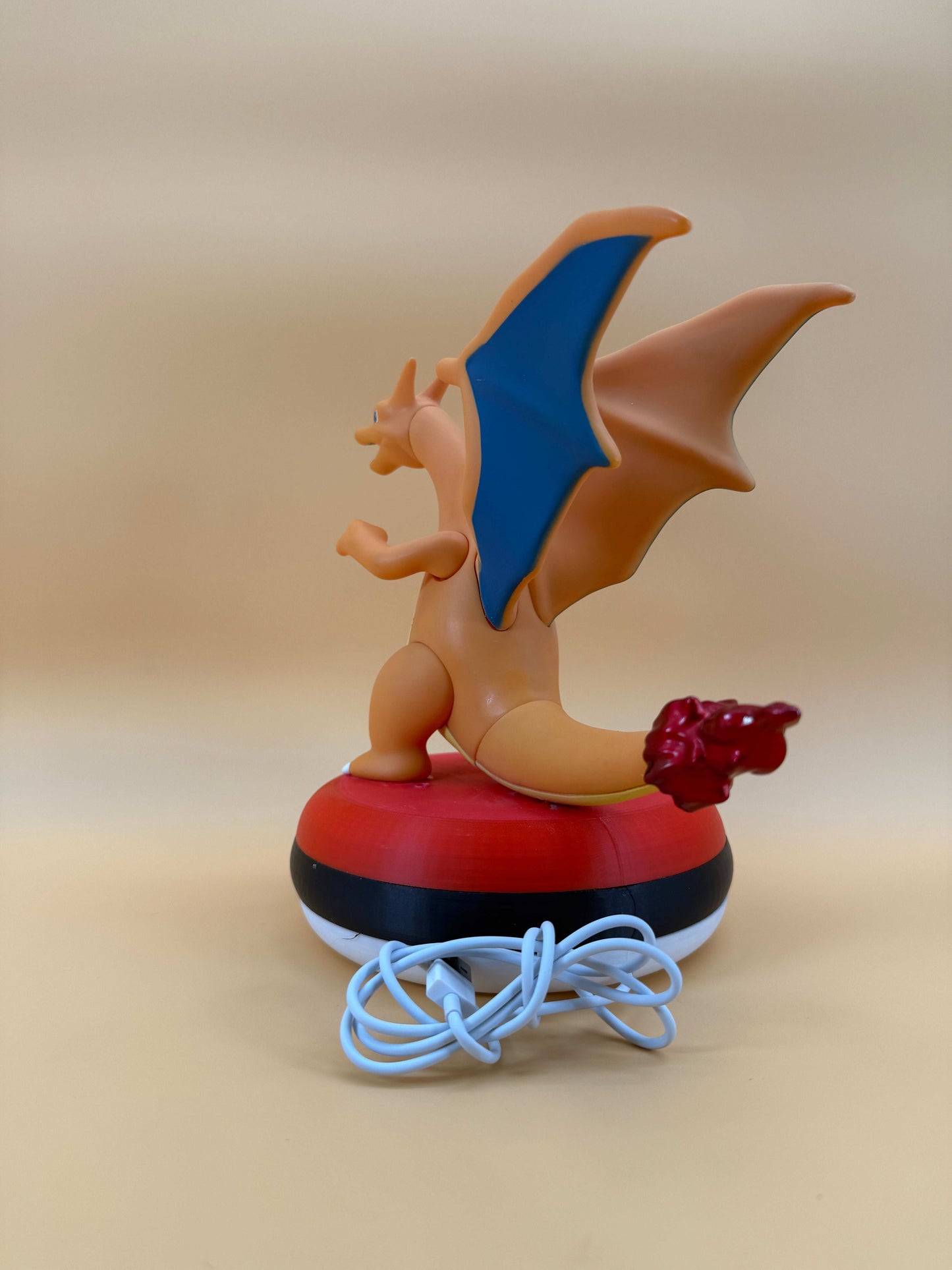 8" Charizard Pokeball USB Desk Lamp with built-in USB cord, featuring Charizard atop a Pokeball design.