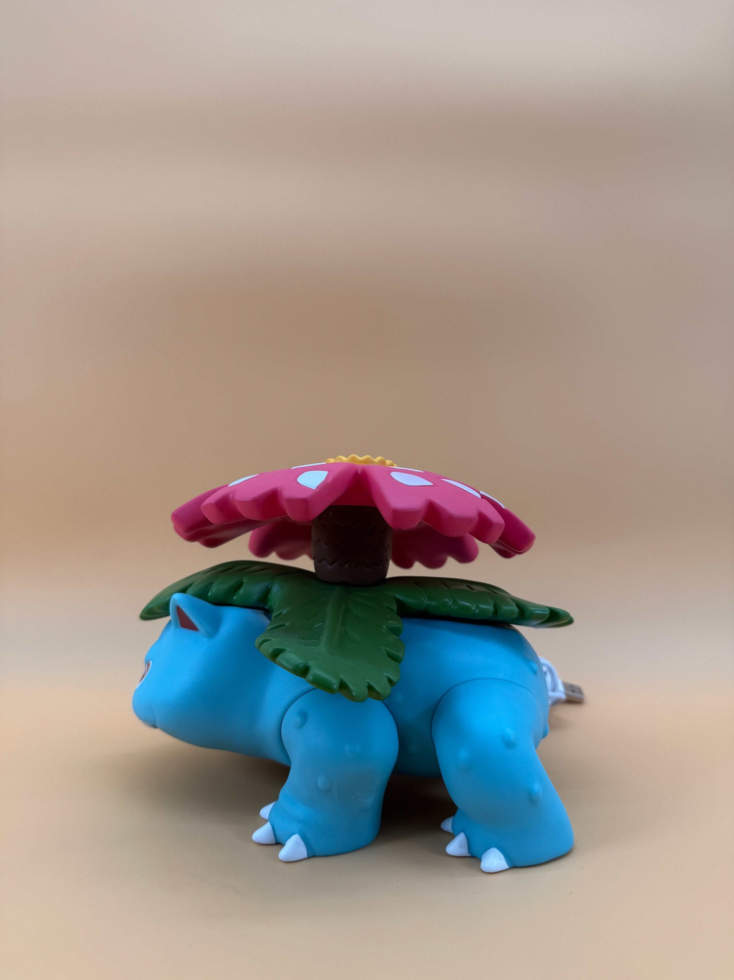 5" x 7" Venusaur statue desk lamp with built-in USB cord, featuring a unique design and free shipping.