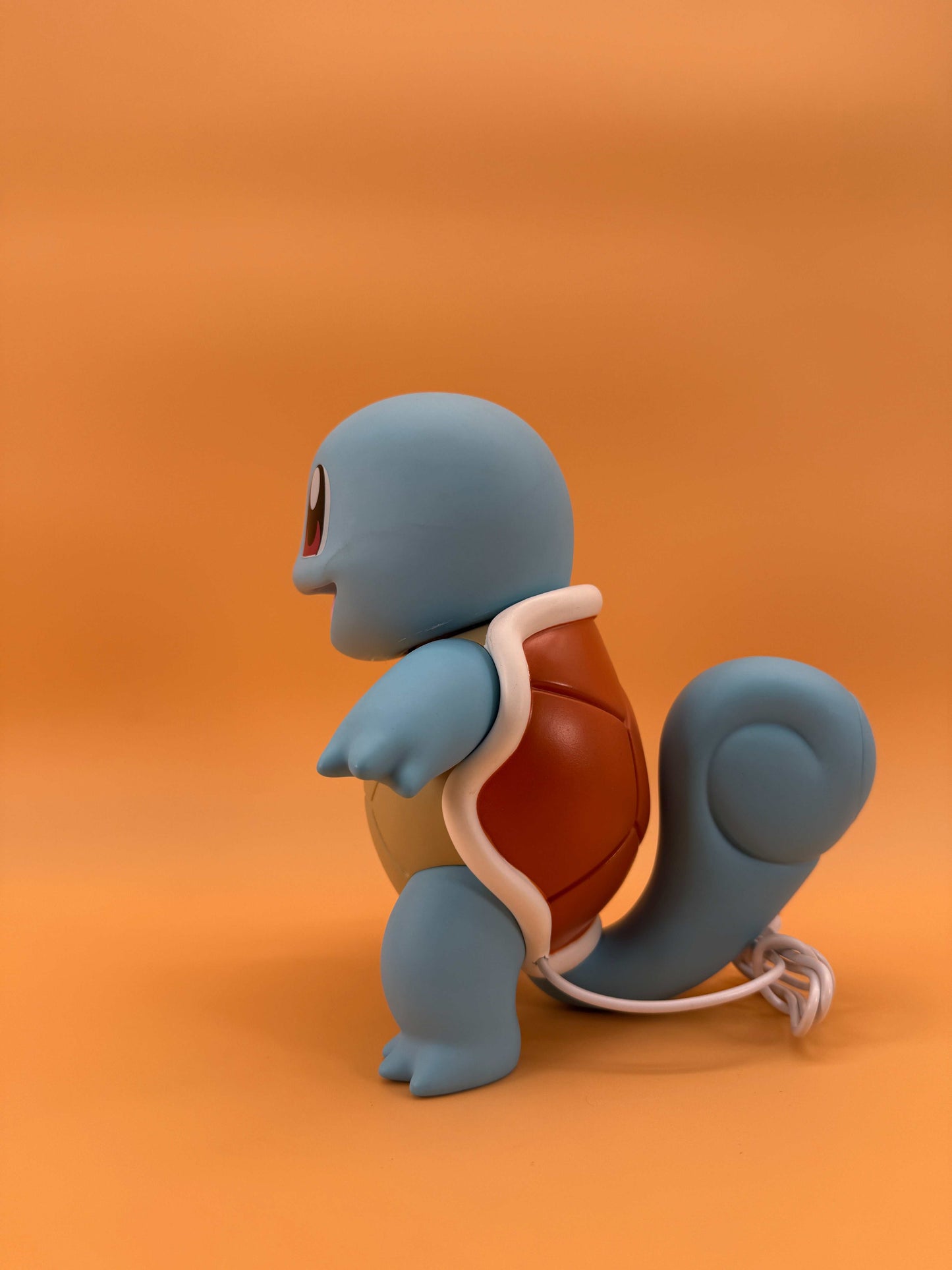 7.8" Squirtle Statue USB Desk Lamp Light on orange background
