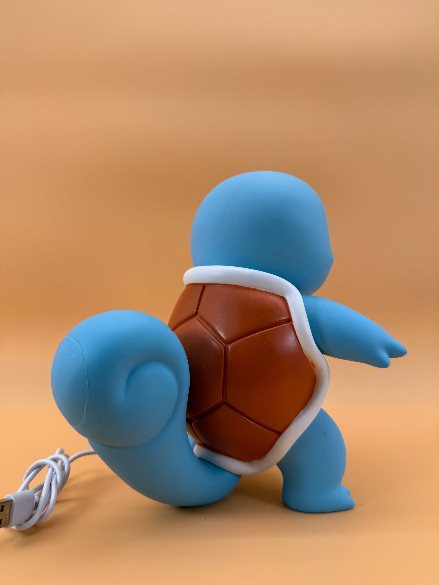 7.8" Squirtle Statue USB Desk Lamp featuring built-in USB cord, ideal for adding a magical touch to your space.