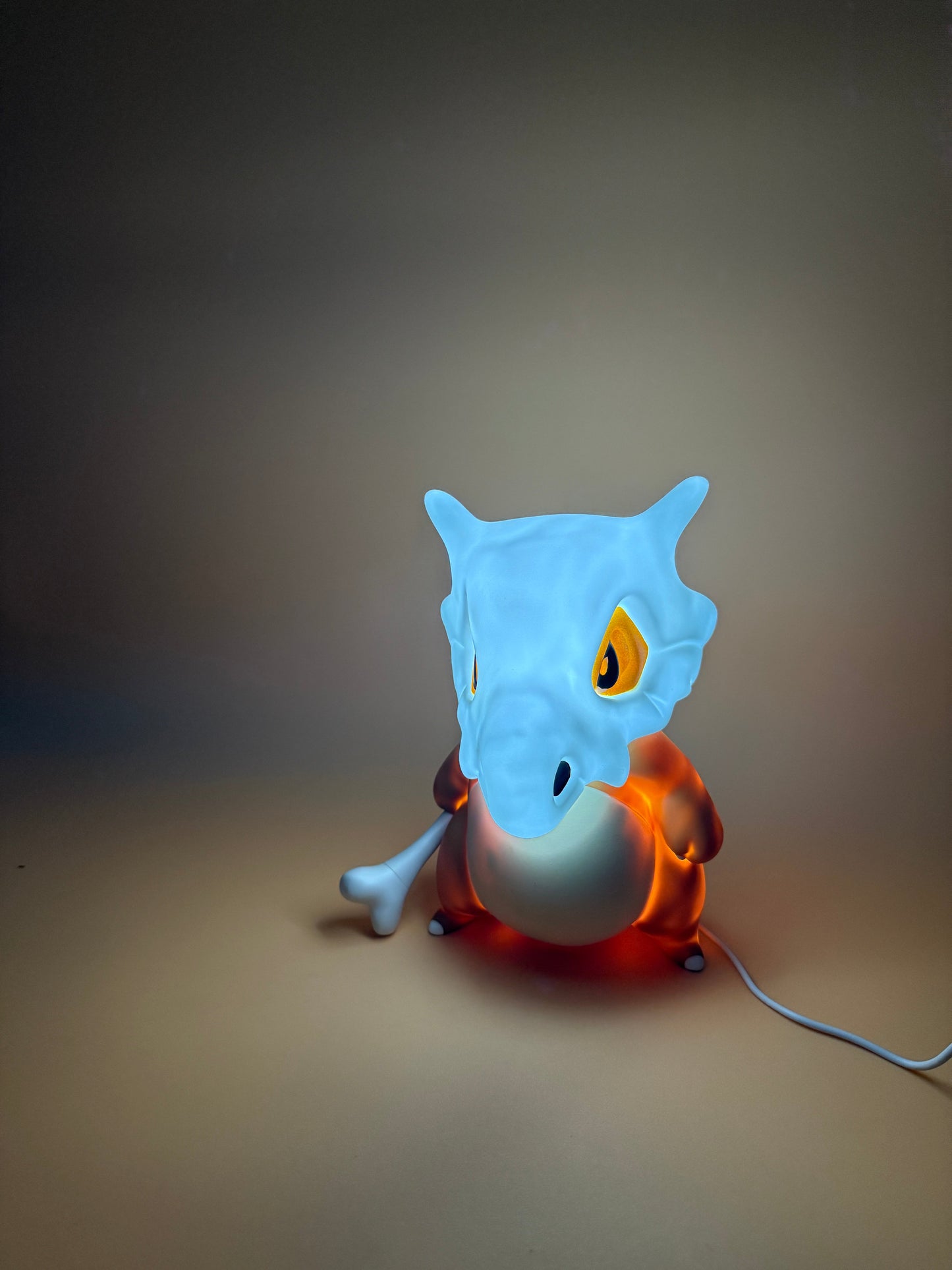 8" Cubone Statue Pokemon USB Desk Lamp with glowing light and built-in USB cord.