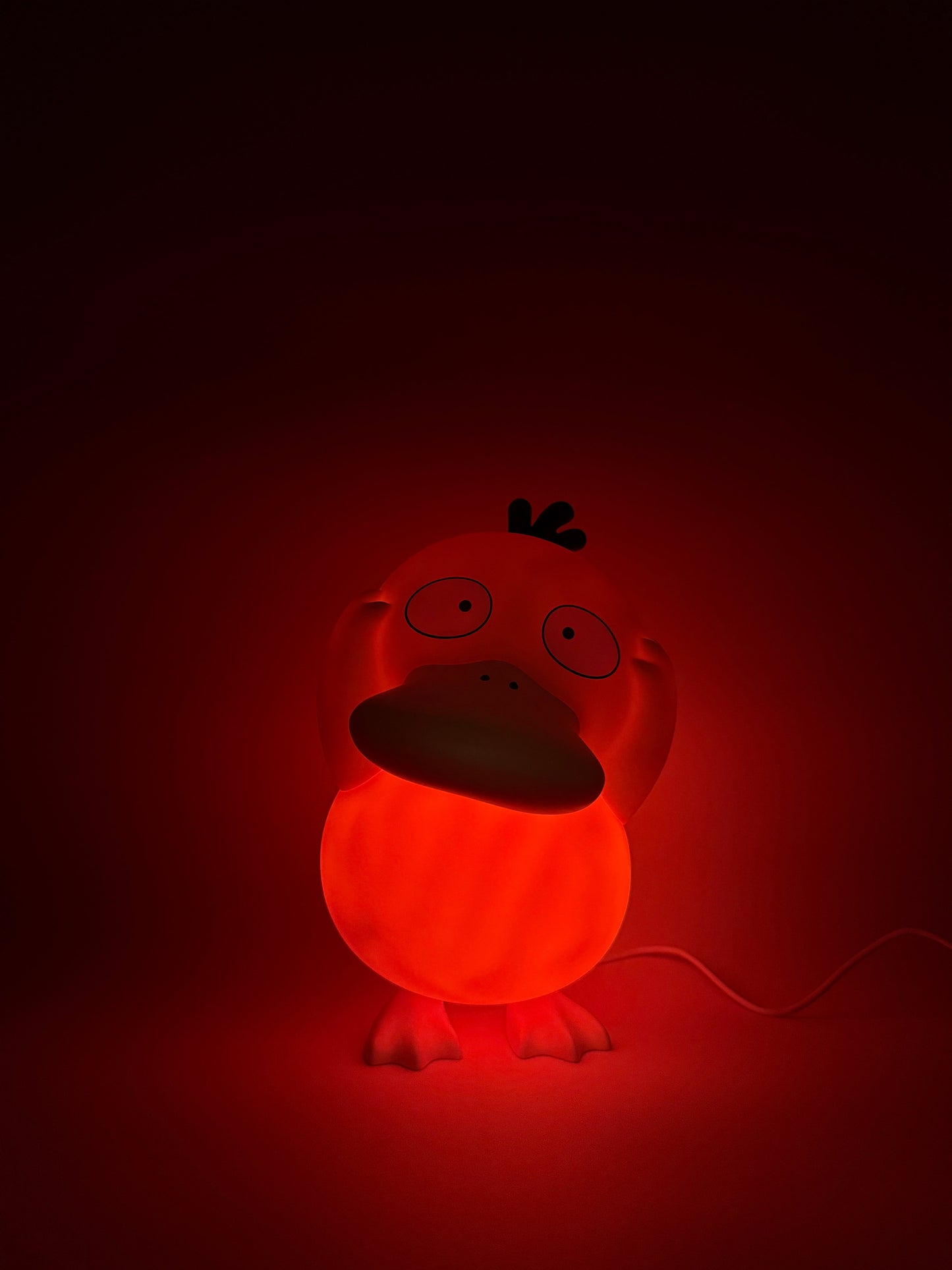8" Psyduck Statue Pokemon USB Desk Lamp glowing in red