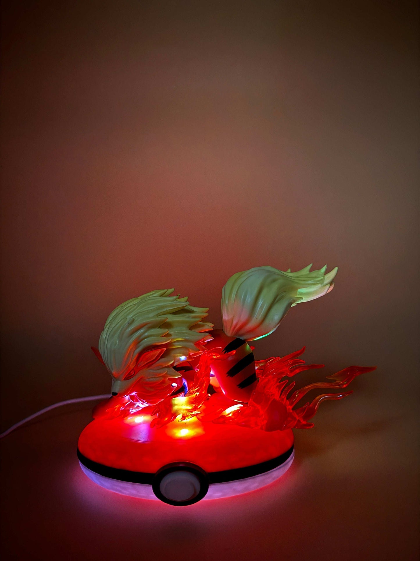 Arcanine Pokeball Stand USB Desk Lamp with glowing base and figure, limited edition.