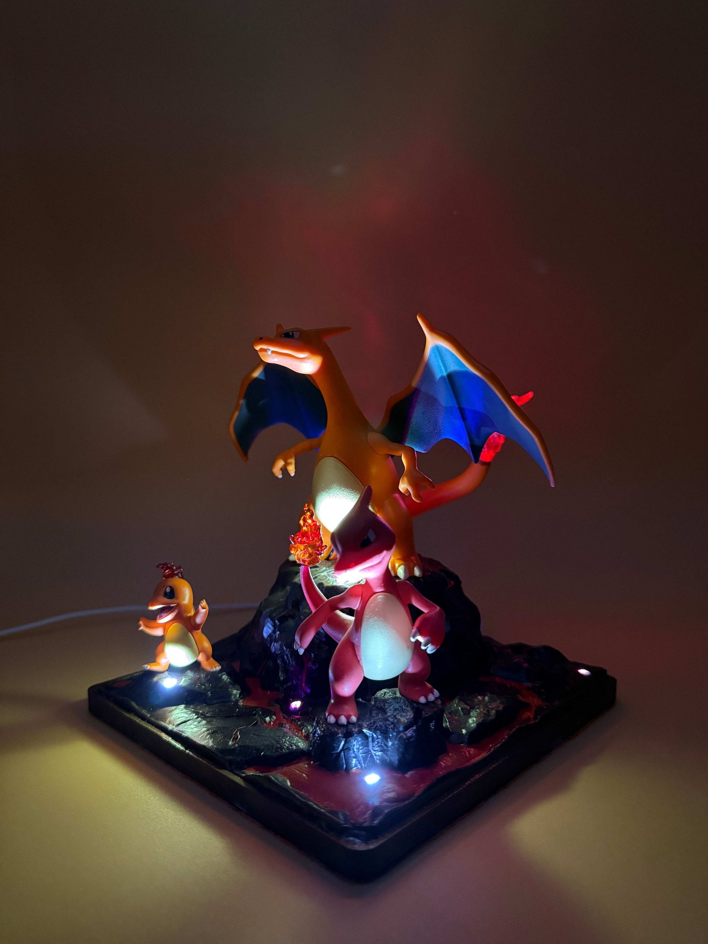 6" Charizard Charmeleon Charmander desk lamp with USB, illuminated on a square base.