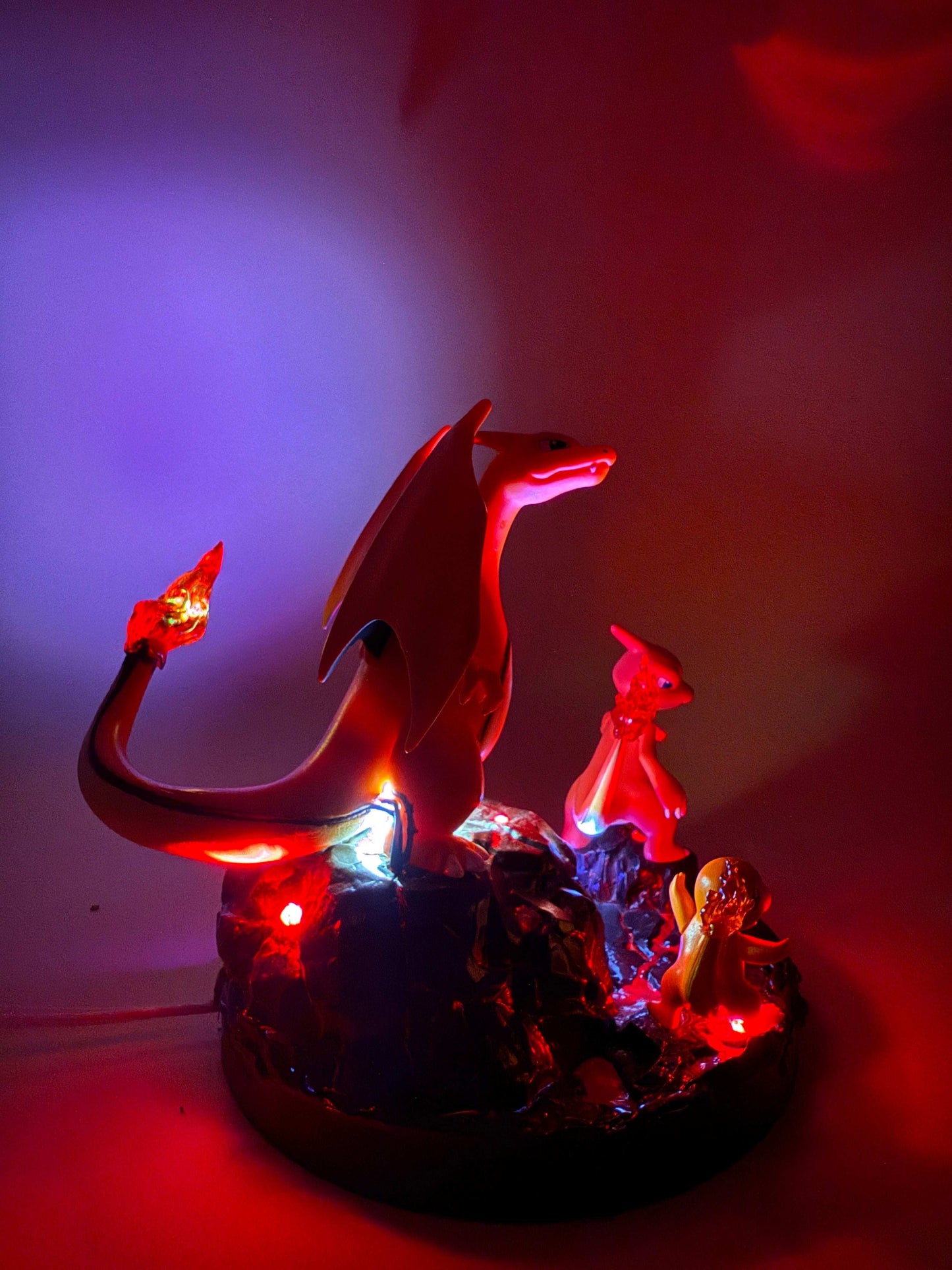6" Charizard Charmeleon Charmander round statue desk lamp with USB, glowing in red and blue lights.