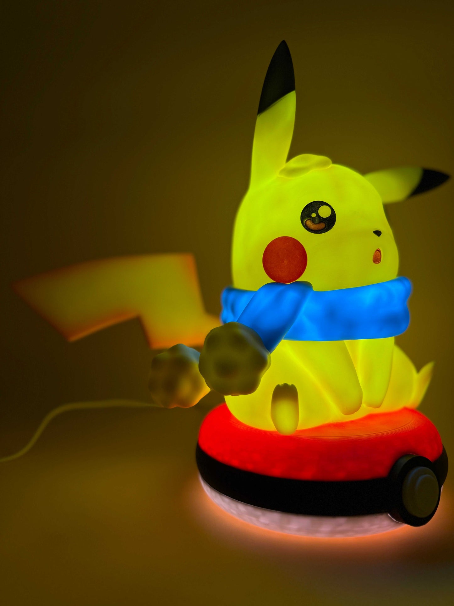 Winter Pikachu Pokeball desk lamp with USB cord, glowing Pikachu statue, limited edition.