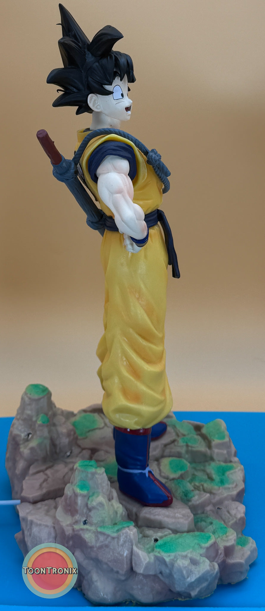 12" 1 FT Goku Statue desk lamp with USB cord on rocky base, Dragonball Z character in yellow outfit and blue boots