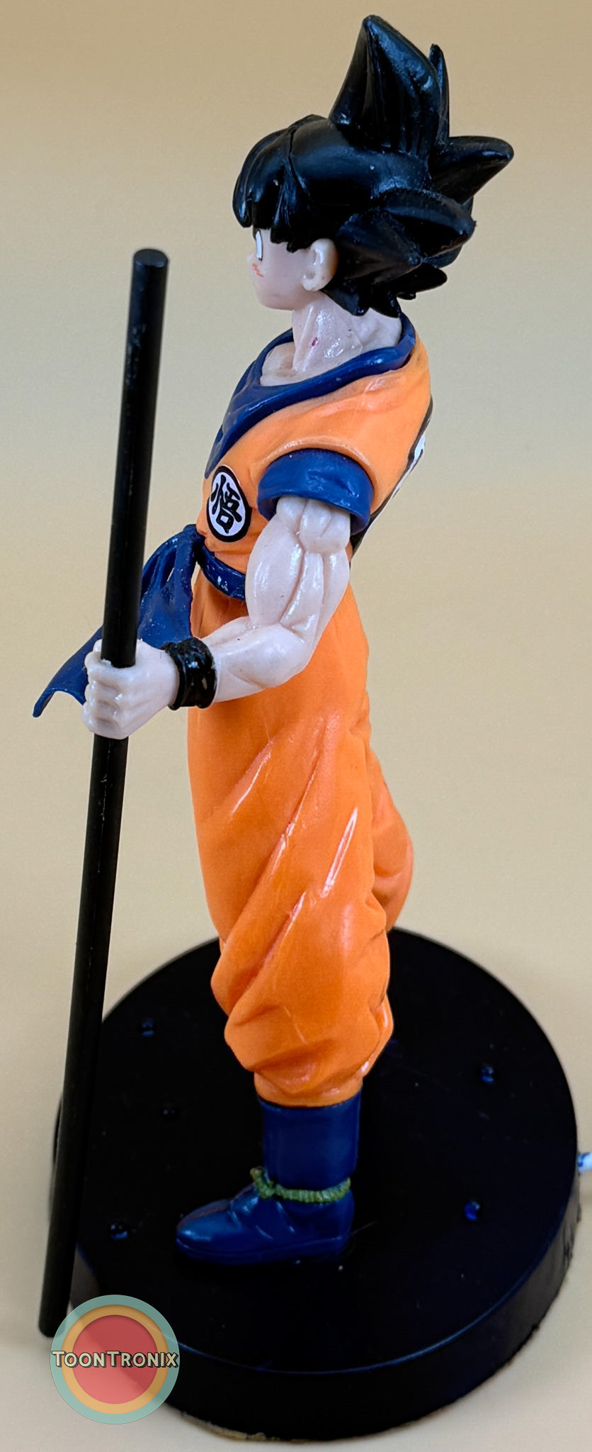 8" Dragonball Z Goku statue desk lamp with USB cord in orange outfit holding staff on black base