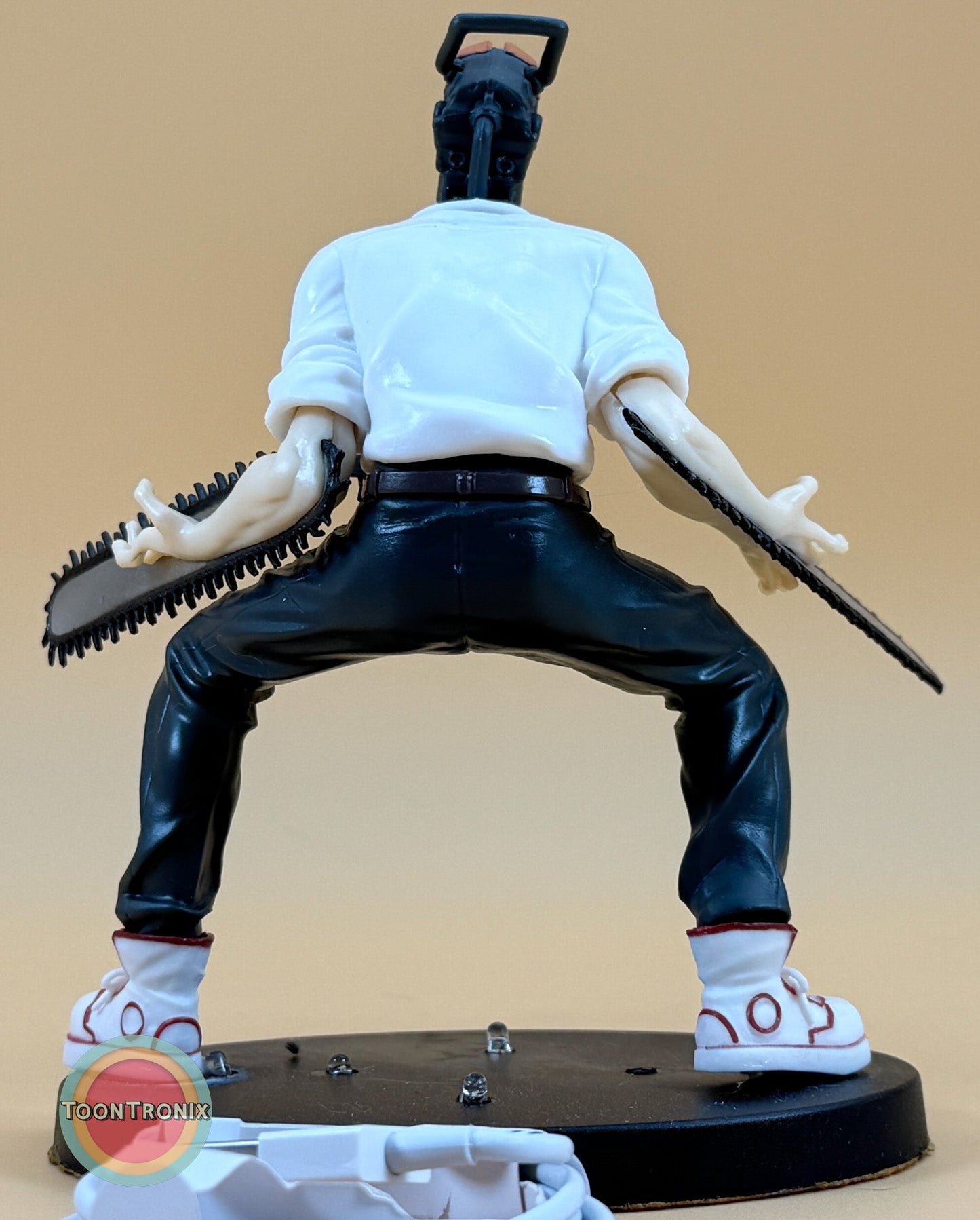 5" Chainsaw Man statue desk lamp with USB cord and detailed figure in dynamic pose on round base