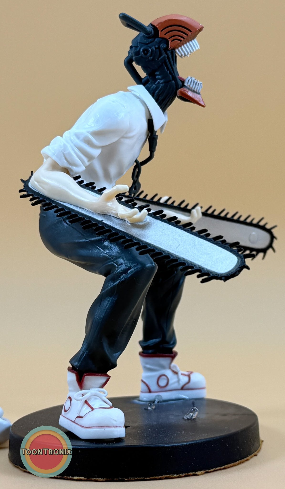 5" Chainsaw Man statue desk lamp with USB cord on round base in dynamic pose