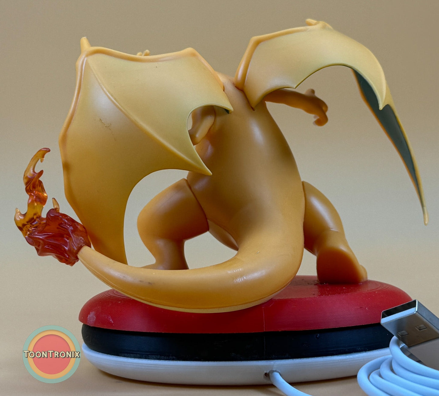 4" Charizard Pokemon statue USB desk lamp with flame tail and wings on red and black base