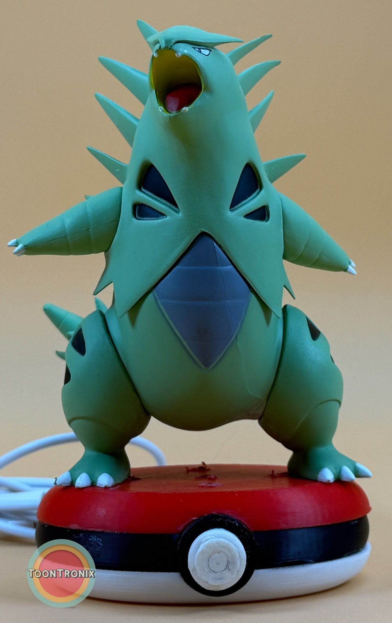 5" Tyranitar desk lamp with USB cord on Pokeball base