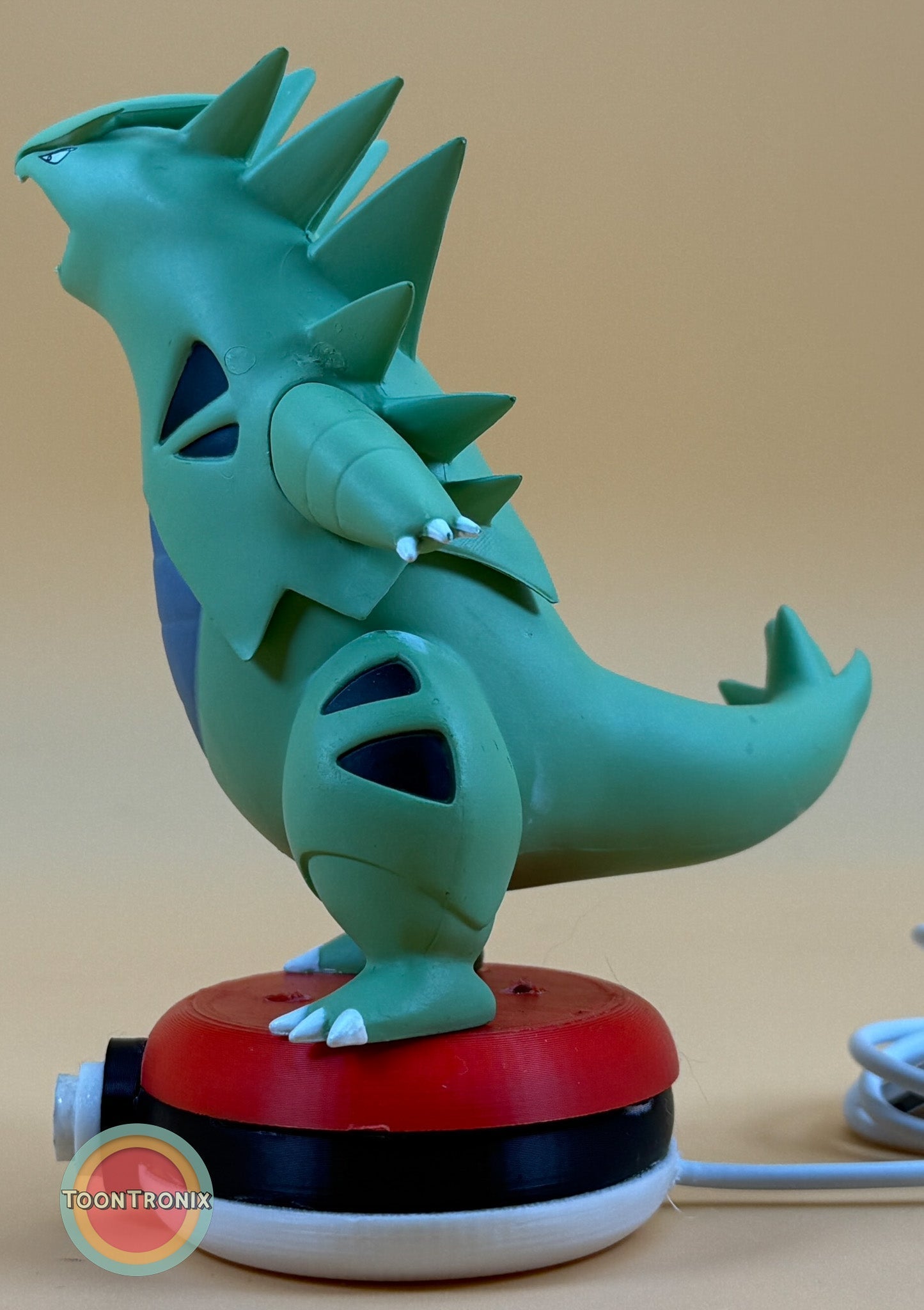 5" Tyranitar desk lamp statue with USB cord on red and black base