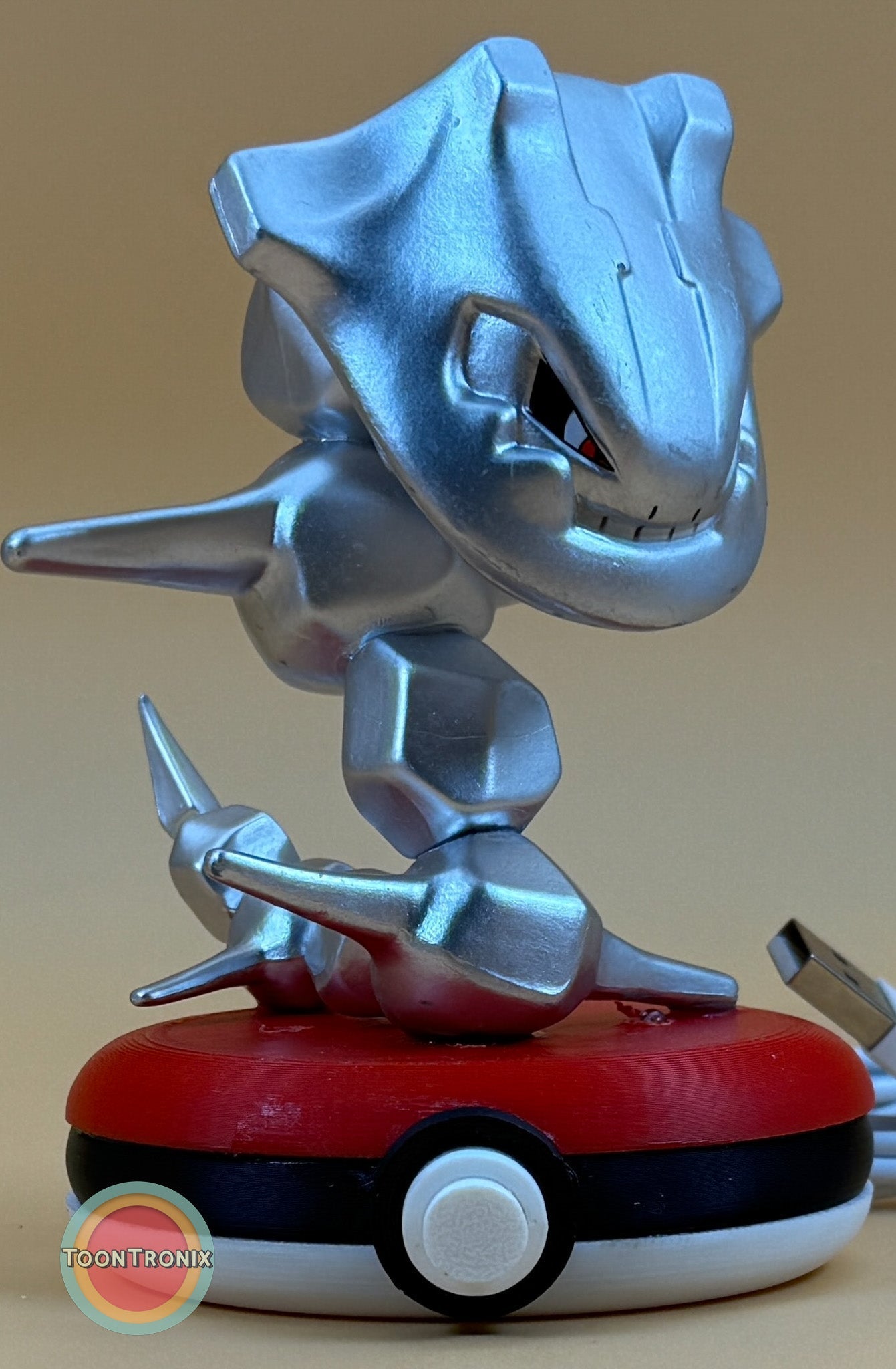 4-inch Steelix Pokemon statue USB desk lamp on Pokeball base with metallic silver finish