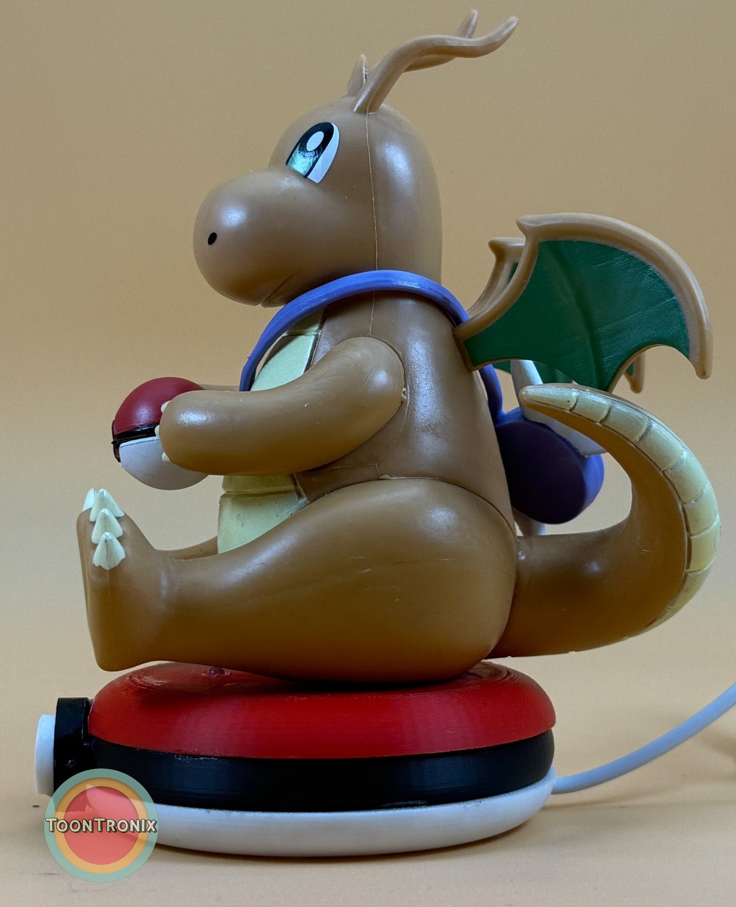 5" Dragonite Pokemon statue USB desk lamp with red base and green wings