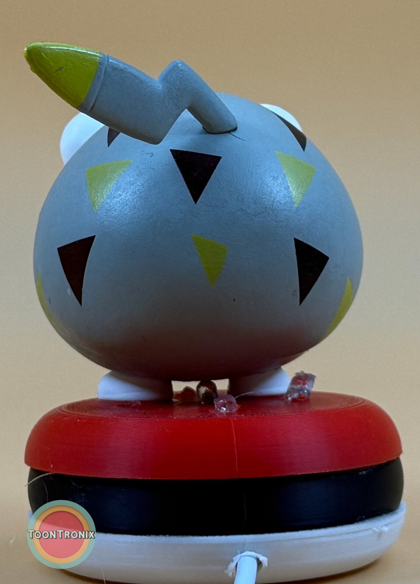 3" Togedemaru Pokemon statue desk lamp with built-in USB cord and colorful triangular patterns on a red and black base