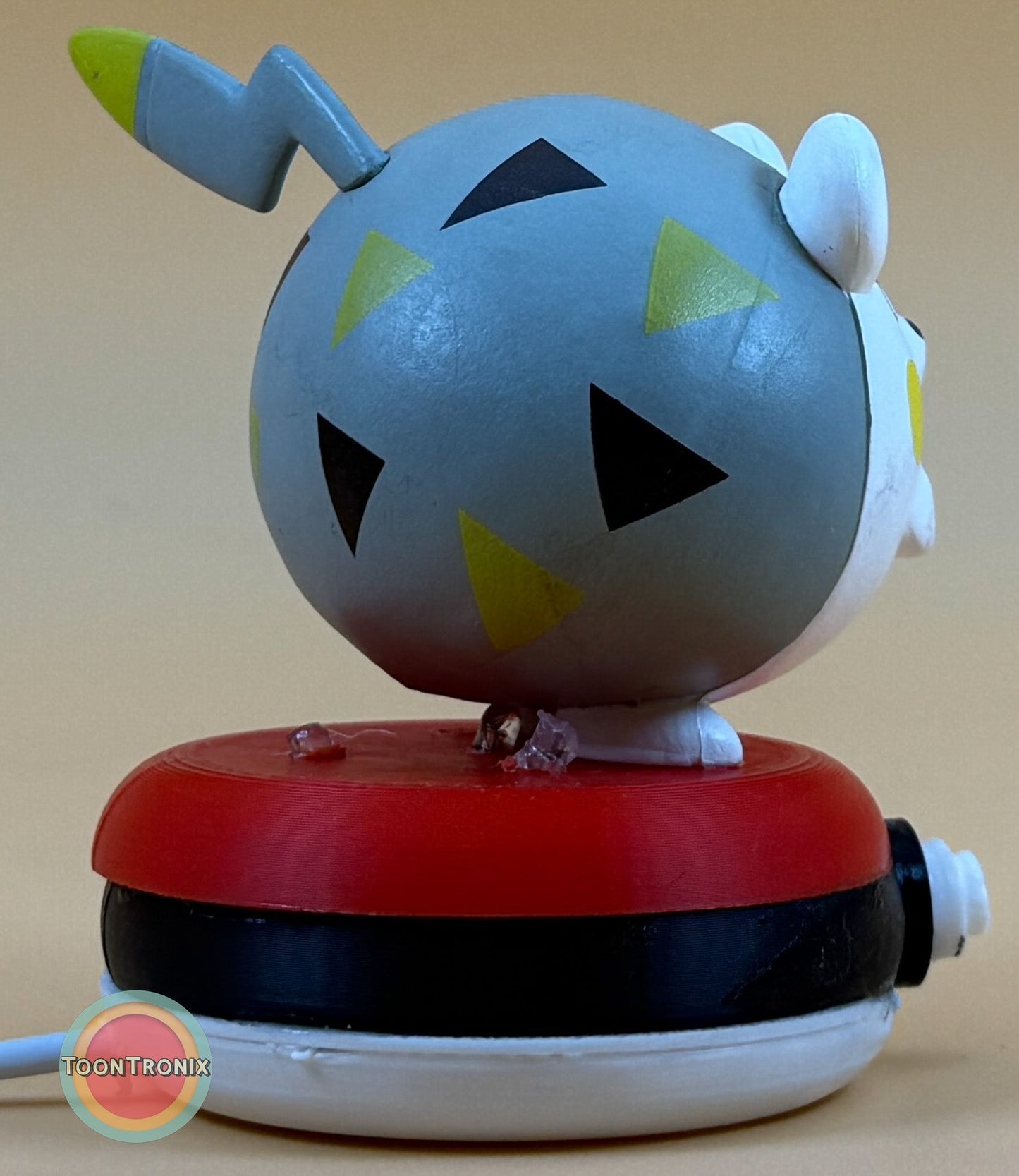 3" Togedemaru Pokemon statue USB desk lamp with colorful geometric patterns and red and black base