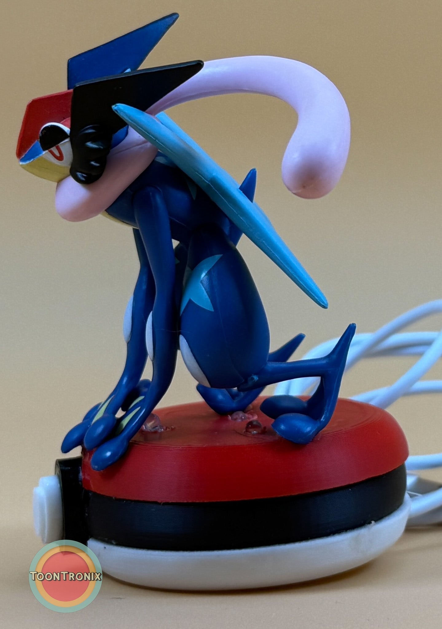 3" Greninja Pokémon USB desk lamp statue on red and white base with USB cord