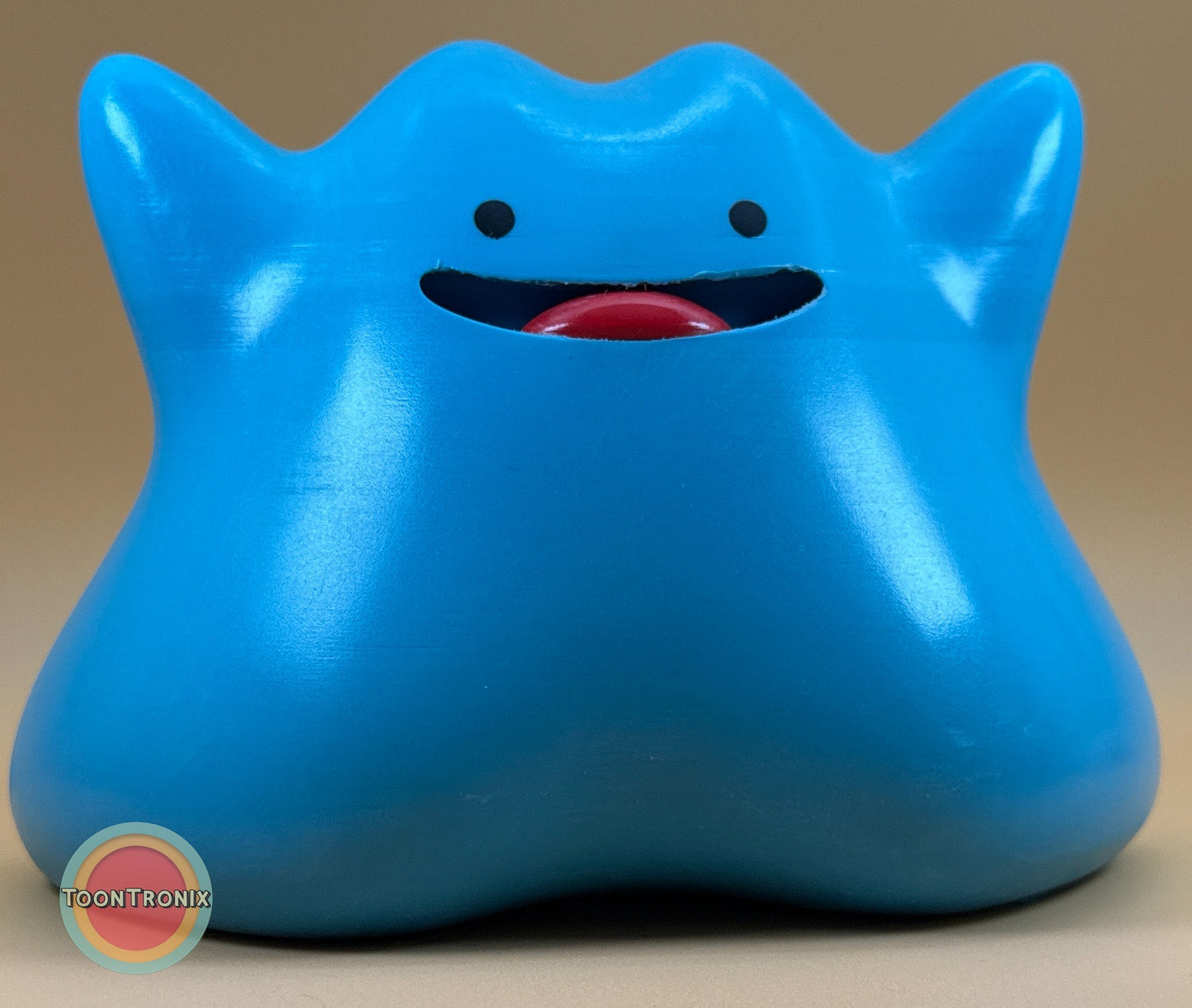 Blue 6 inch Ditto Pokemon statue USB desk lamp with built-in cord and wood-like finish