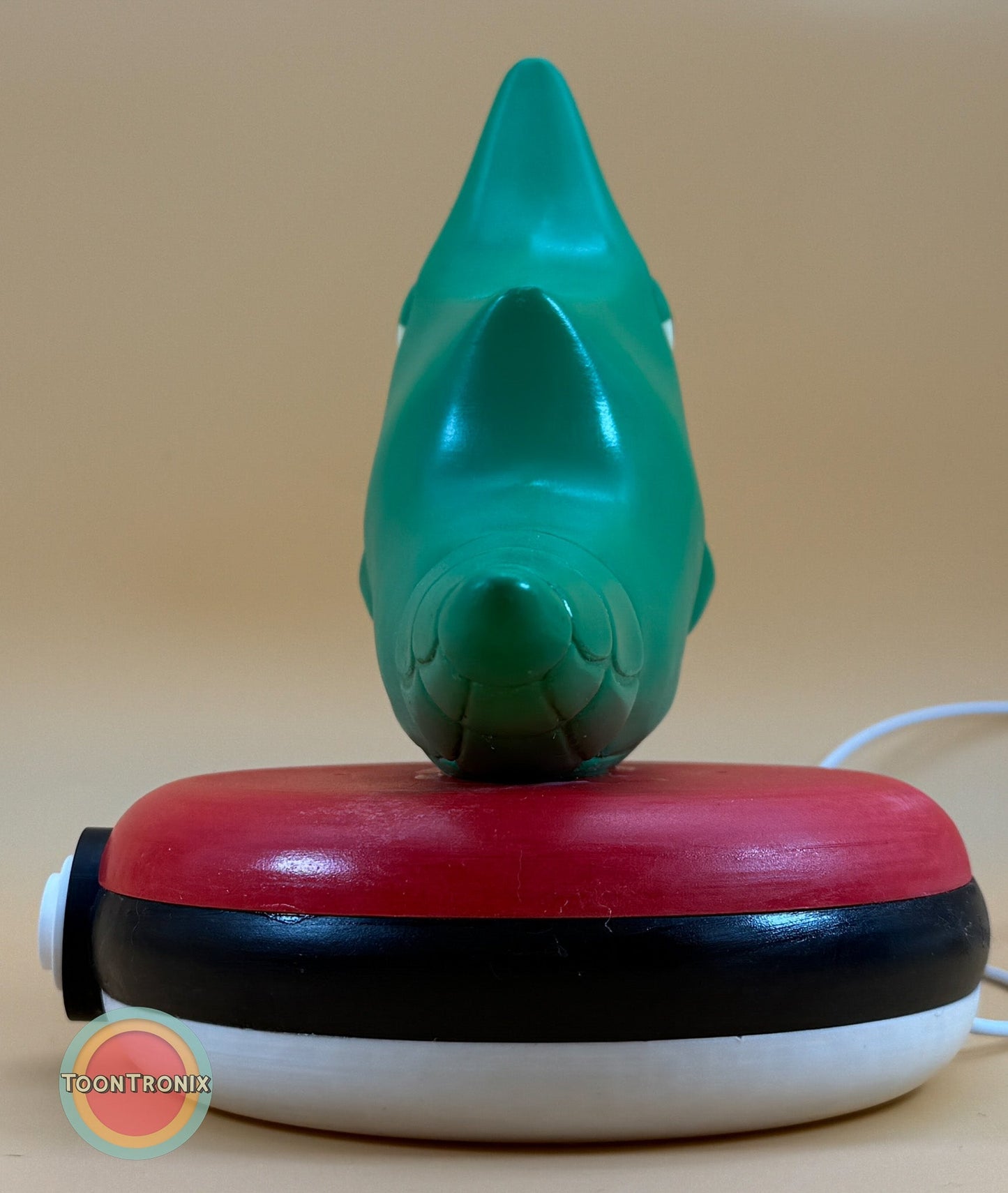 8" Metapod Pokemon Statue USB Desk Lamp with woodified base resembling a Pokeball