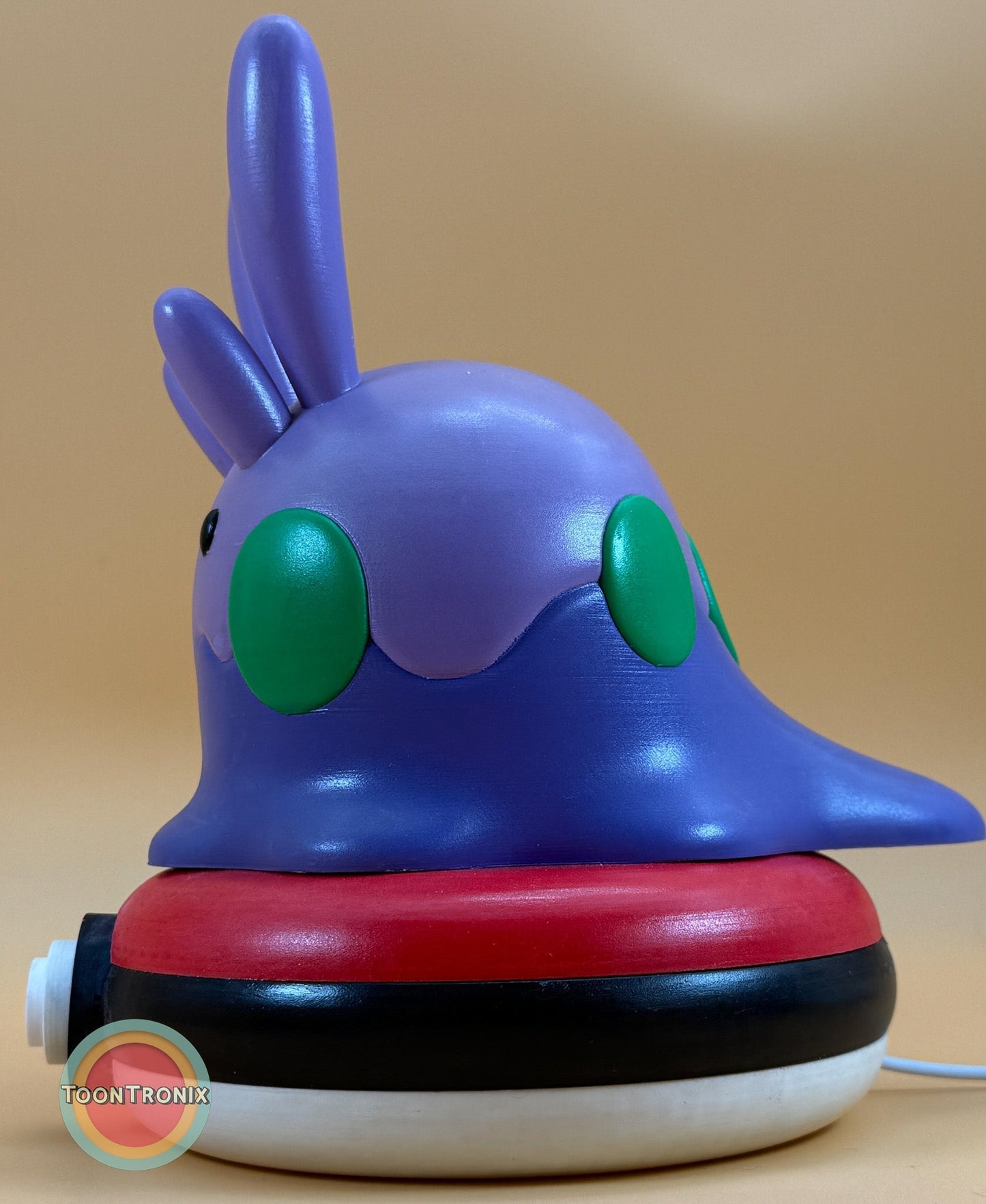 8" Goomy Pokemon statue desk lamp with USB cord and wood-like finish