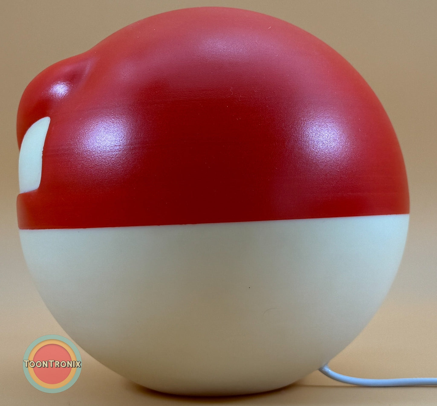 6" Voltorb Pokemon statue desk lamp with built-in USB cord and wood-like finish