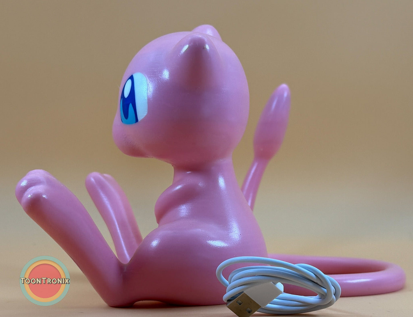 6" tall 11" wide pink Mew Pokemon statue desk lamp with USB cord and wood-like finish
