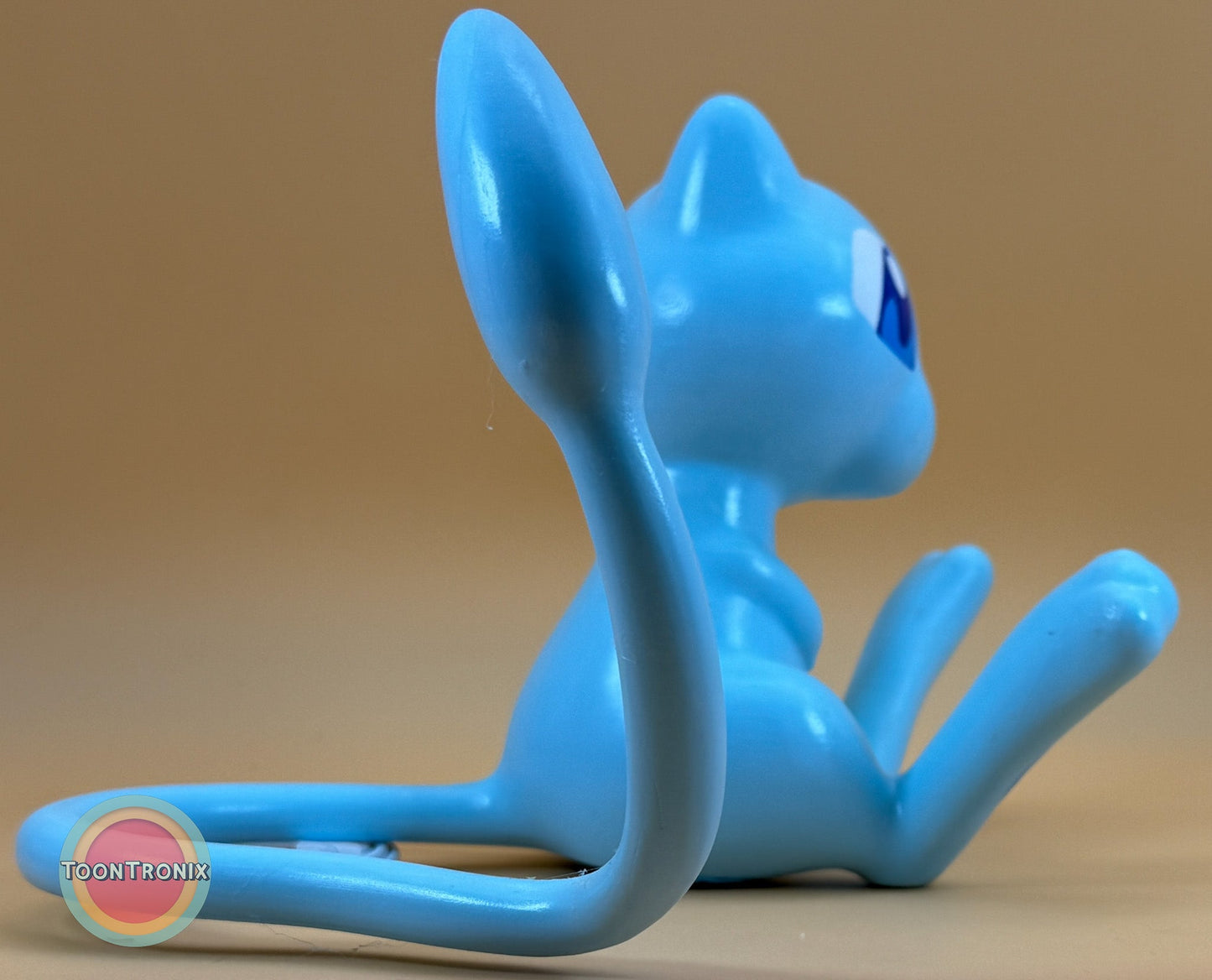 6" tall 11" wide shiny Mew Pokemon statue desk lamp with blue finish and built-in USB cord