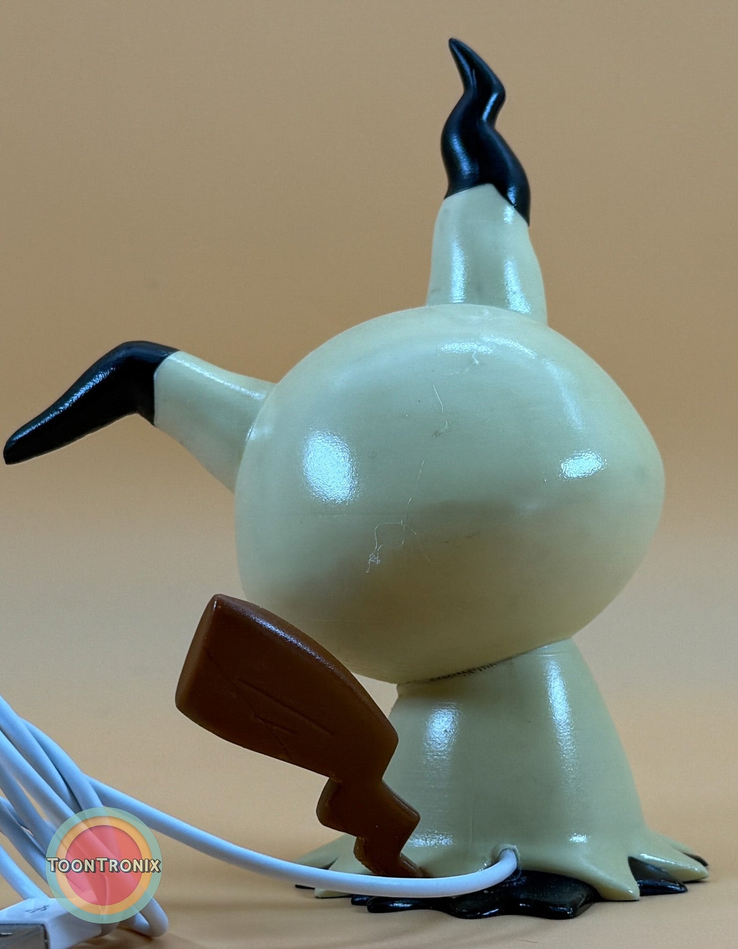 6" Mimikyu Pokemon statue desk lamp with USB cord and wood-like finish