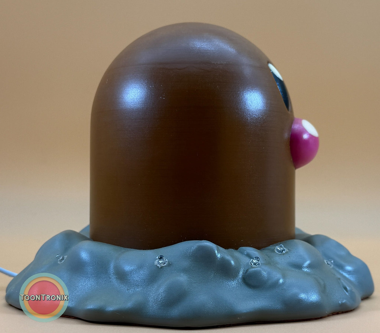 6" tall Diglett Pokemon statue desk lamp with USB cord and wood-like finish sitting on grey textured base