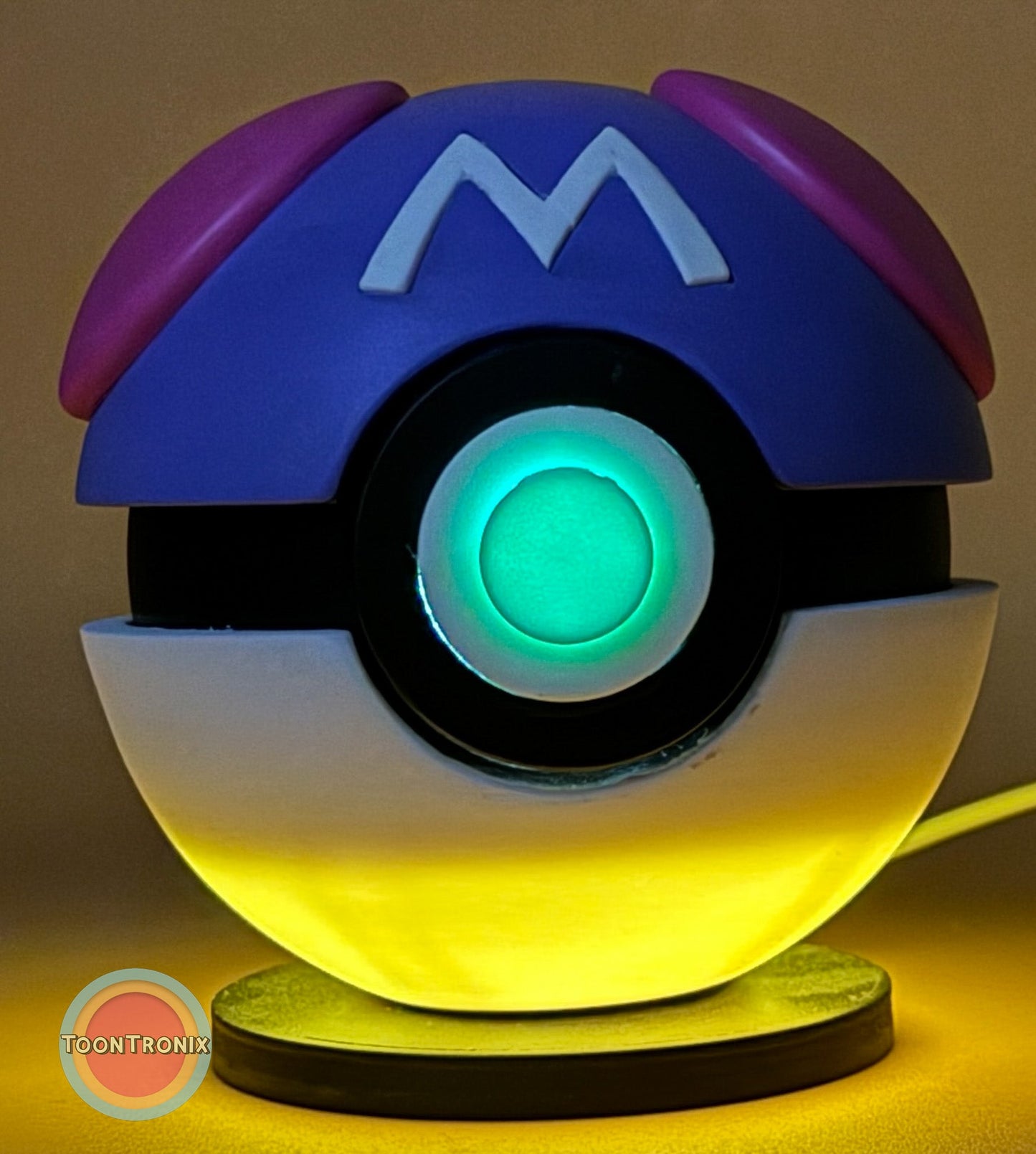 4.5" and 5.8" Pokeball Premier Ball Master Ball USB desk lamp with wood-like finish and glowing center