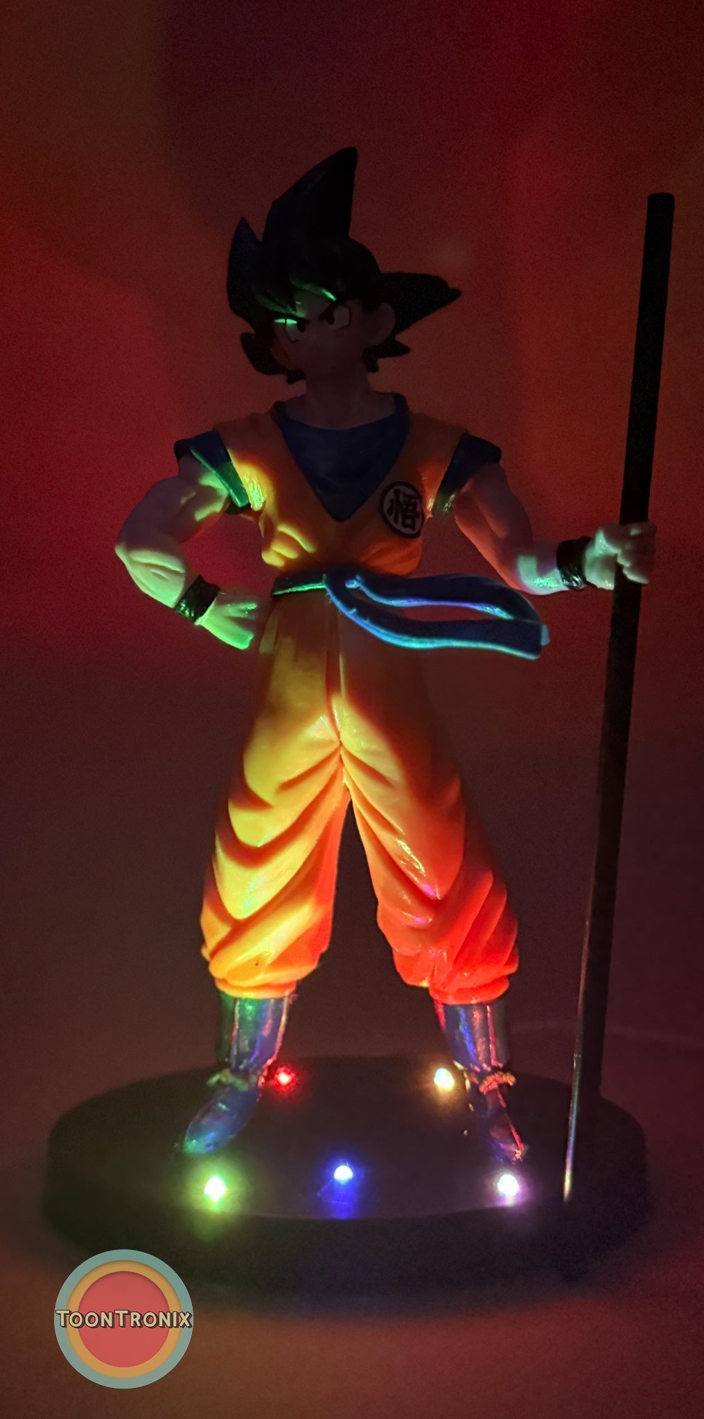 8" Dragonball Z Goku Statue USB desk lamp glowing with multicolor LED lights on base