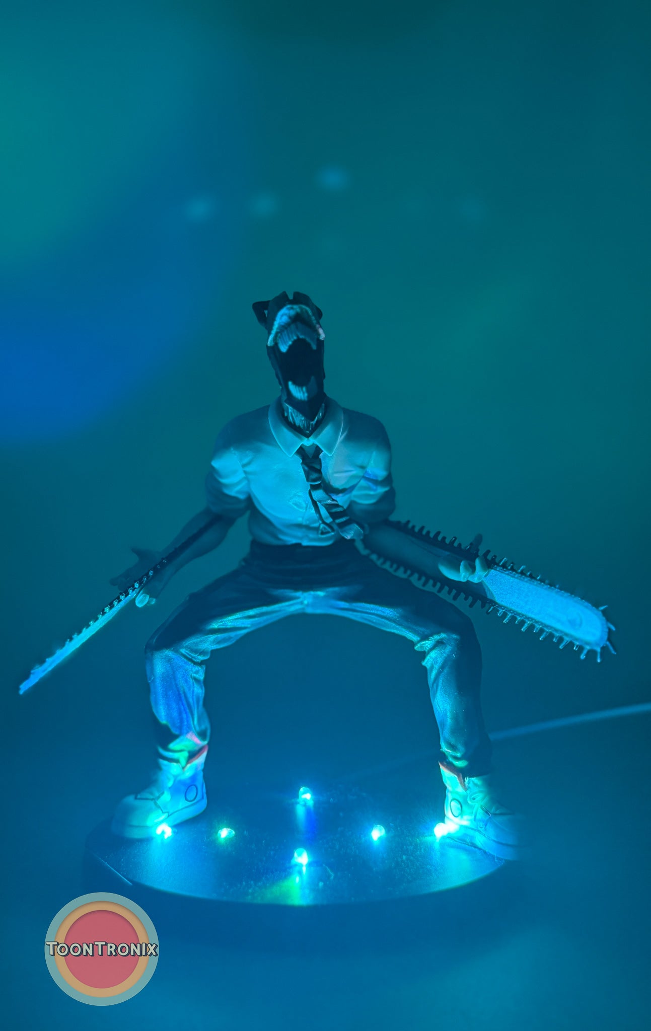 5" Chainsaw Man statue USB desk lamp glowing with blue LED lights on a circular base