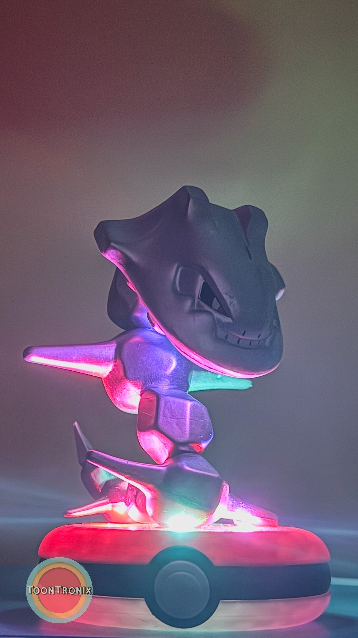 4" Steelix Pokemon statue USB desk lamp illuminated on Pokeball base with colorful lighting