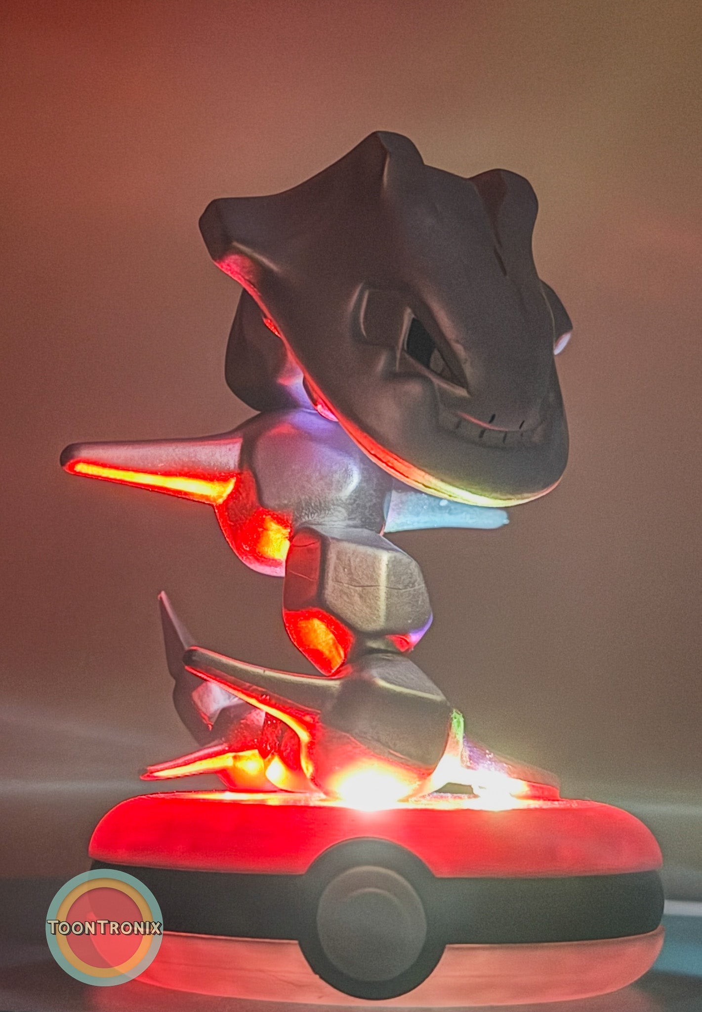 4-inch Steelix Pokémon statue USB desk lamp with red illumination on Poké Ball base