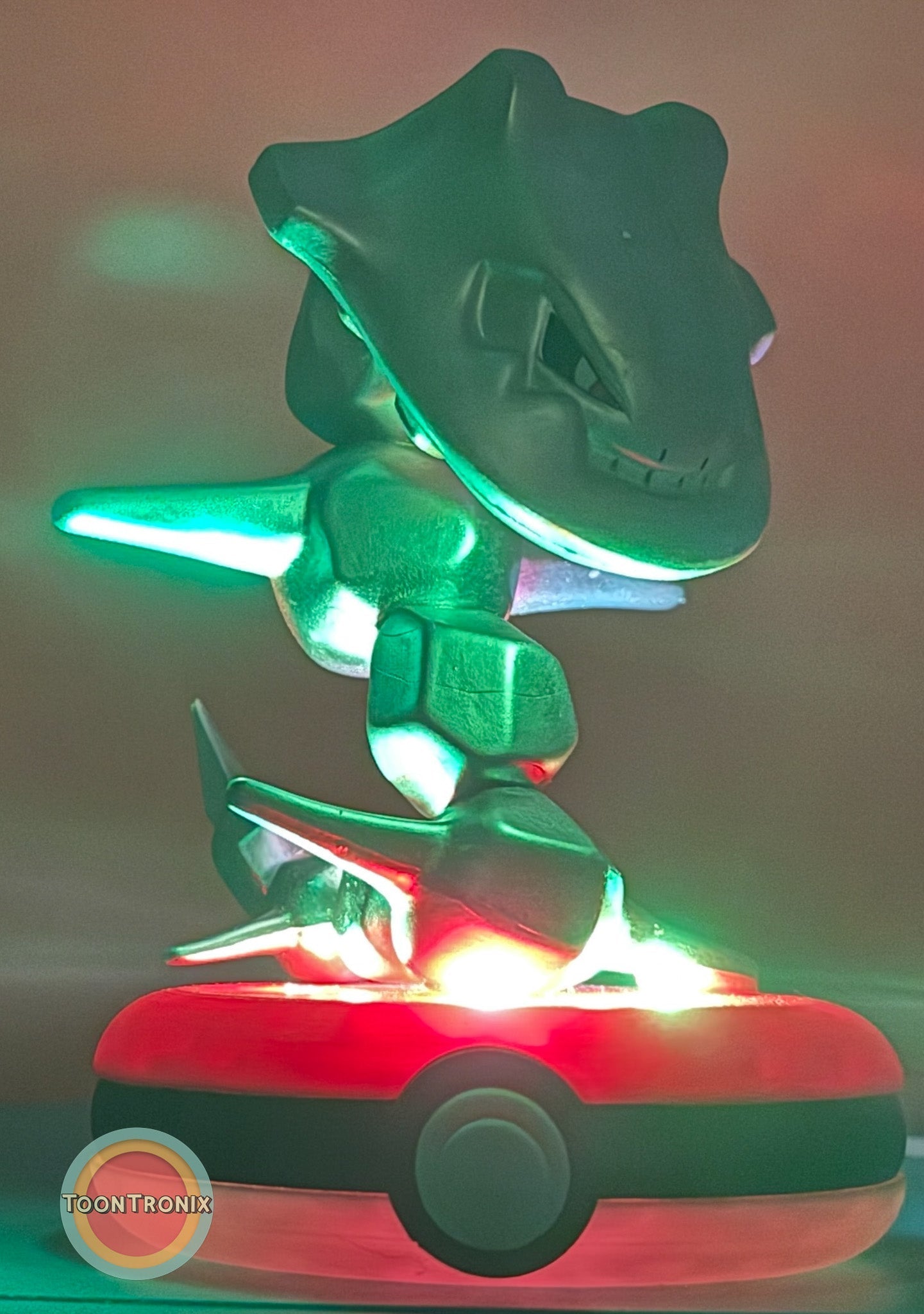 4-inch Steelix Pokemon statue desk lamp with built-in USB cord glowing on Pokeball base