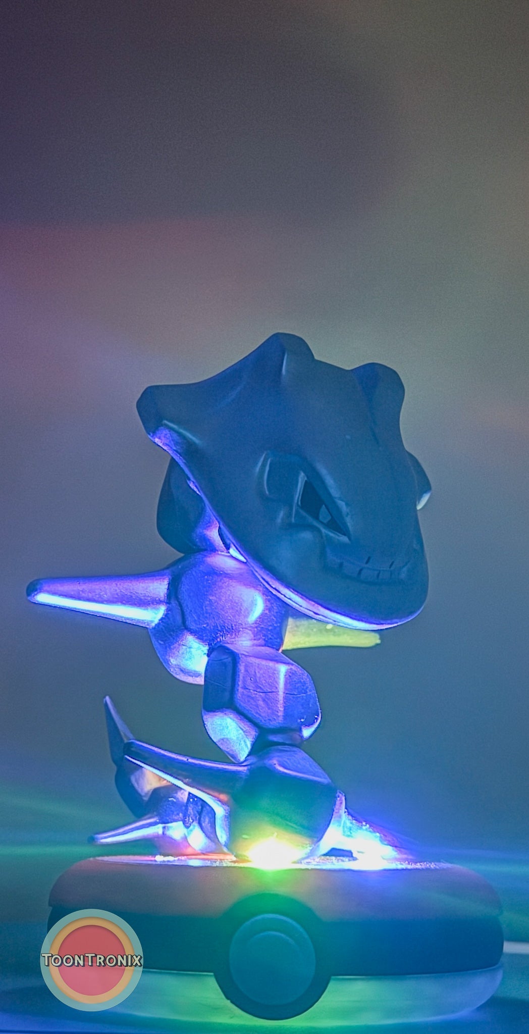 4-inch Steelix Pokemon statue USB desk lamp glowing with colorful light on a circular base