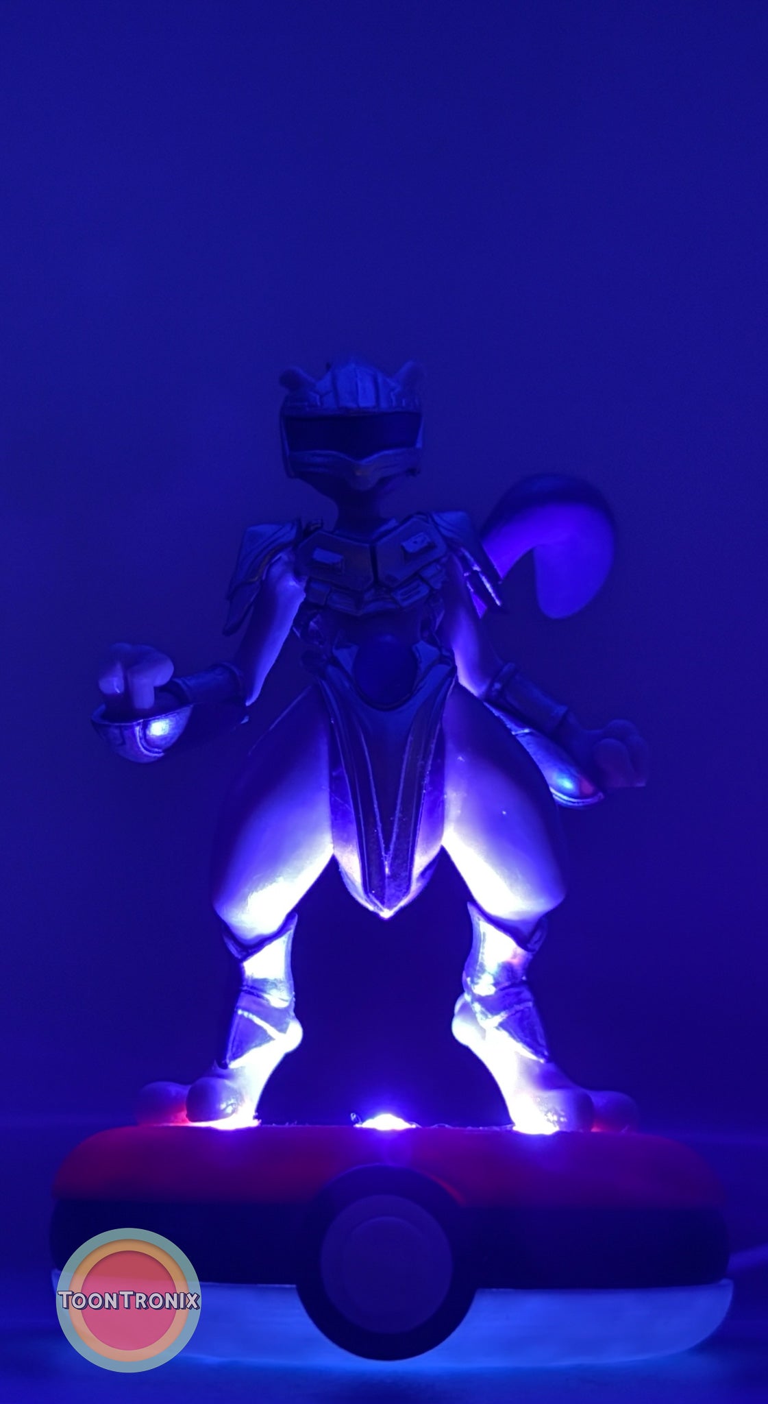 5" Mewtwo Pokemon statue USB desk lamp glowing purple on Pokeball base