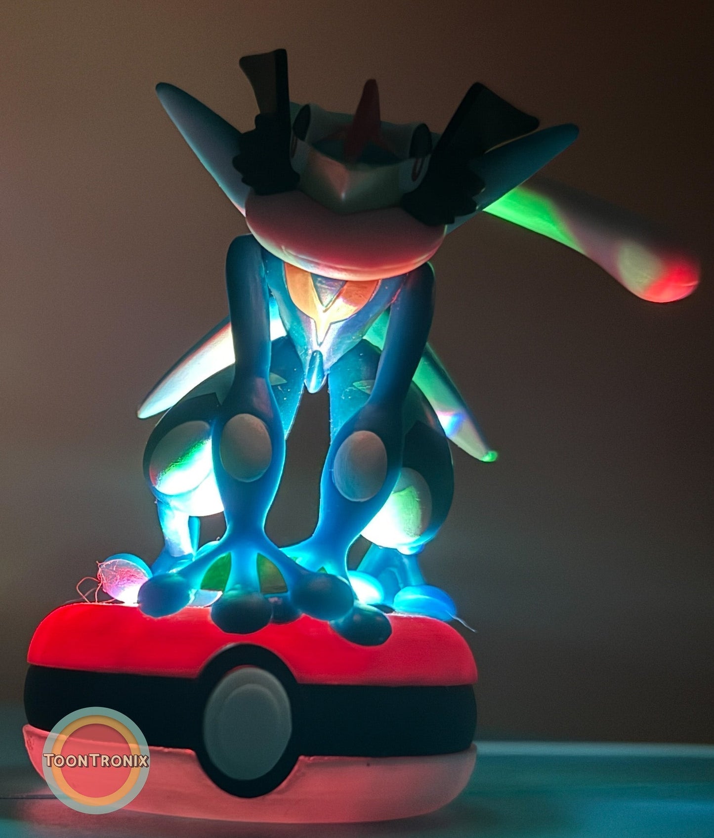 3" Greninja Pokémon statue USB desk lamp glowing on Pokéball base